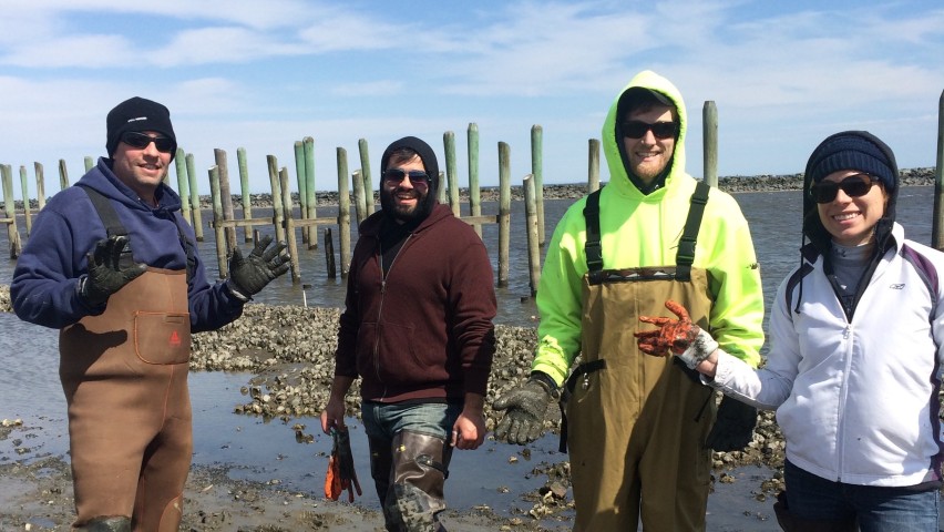 Jon Miller and students cleaning up coastal water