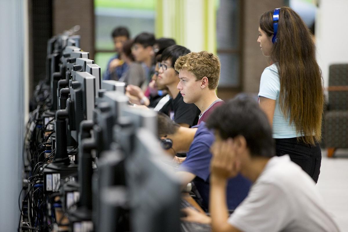 Students in classroom working on computers