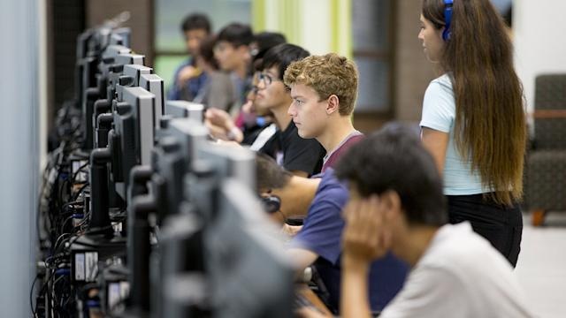 Students in classroom working on computers