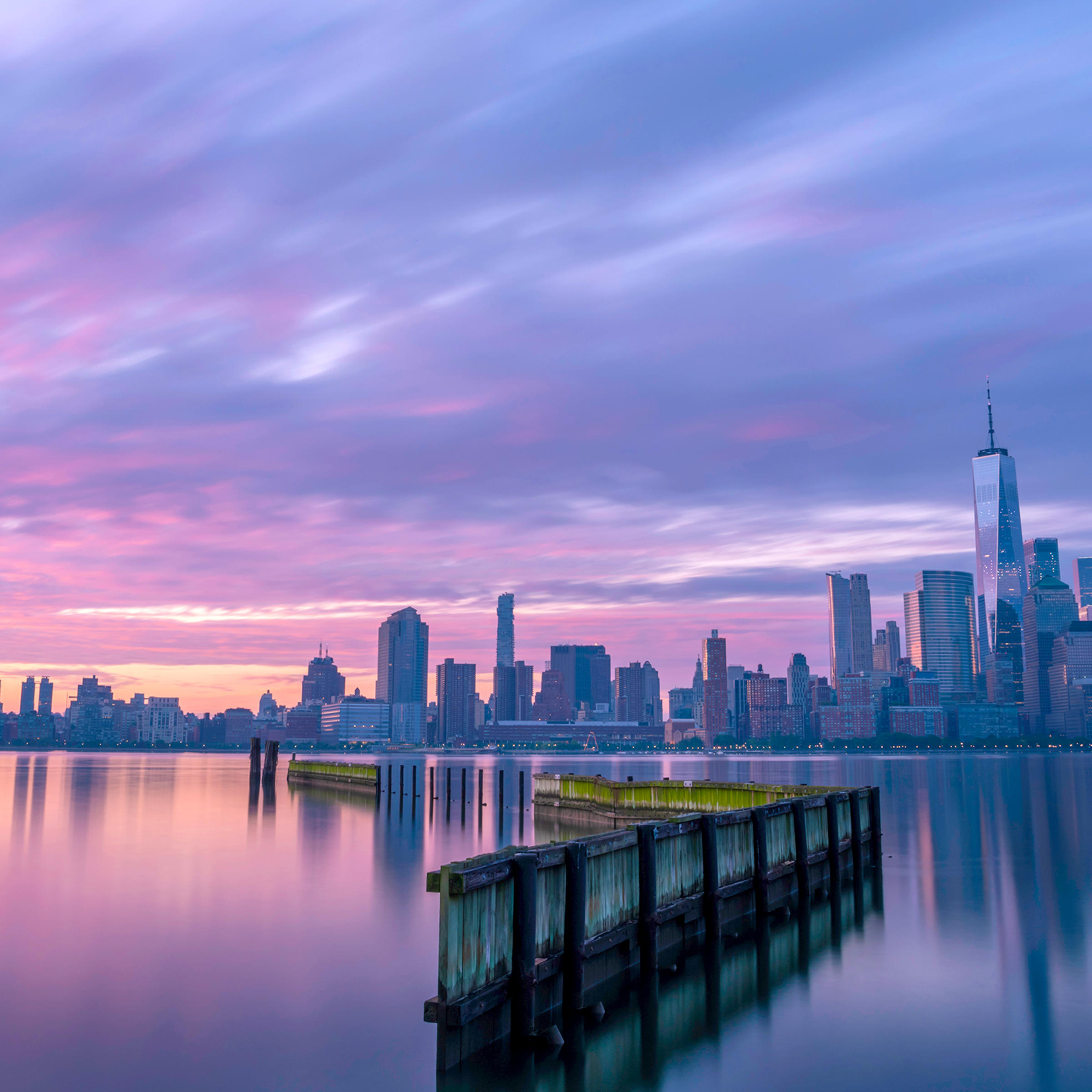 sunset along the Hudson River with the WTC and New York City skyline