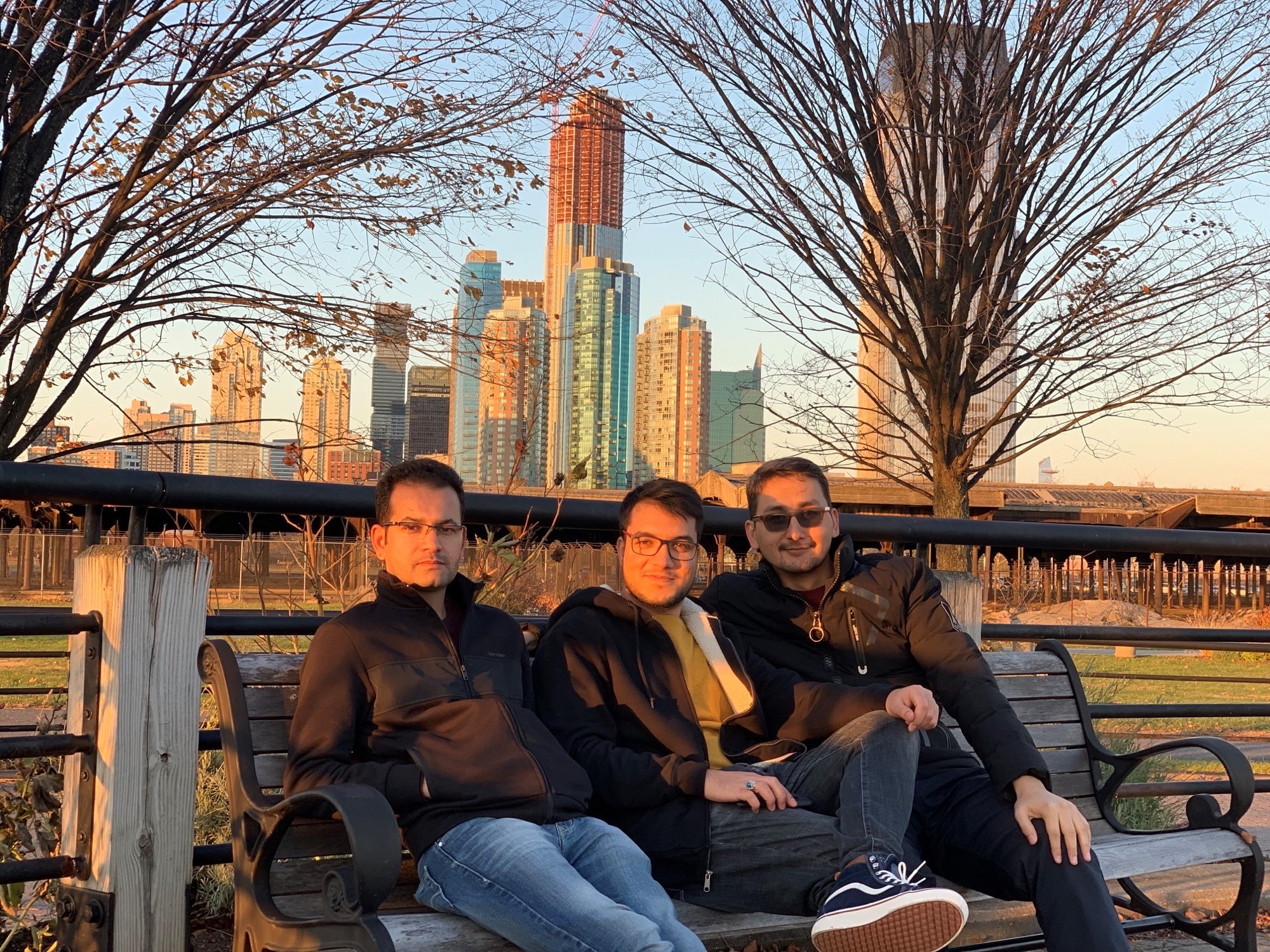 Iqbal Sadat M.S. '20, Hosam Stanikzai M.Eng. ’20 and Mohammad Hassany M.S. '20 sitting on bench