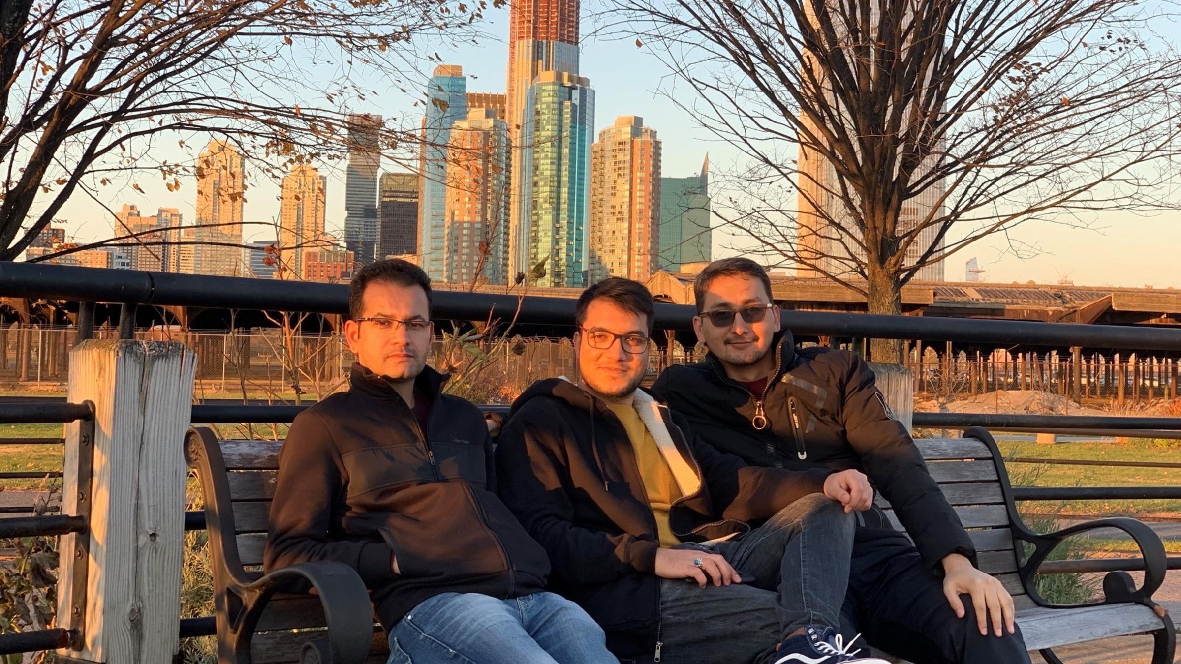 Iqbal Sadat M.S. '20, Hosam Stanikzai M.Eng. ’20 and Mohammad Hassany M.S. '20 sitting on bench