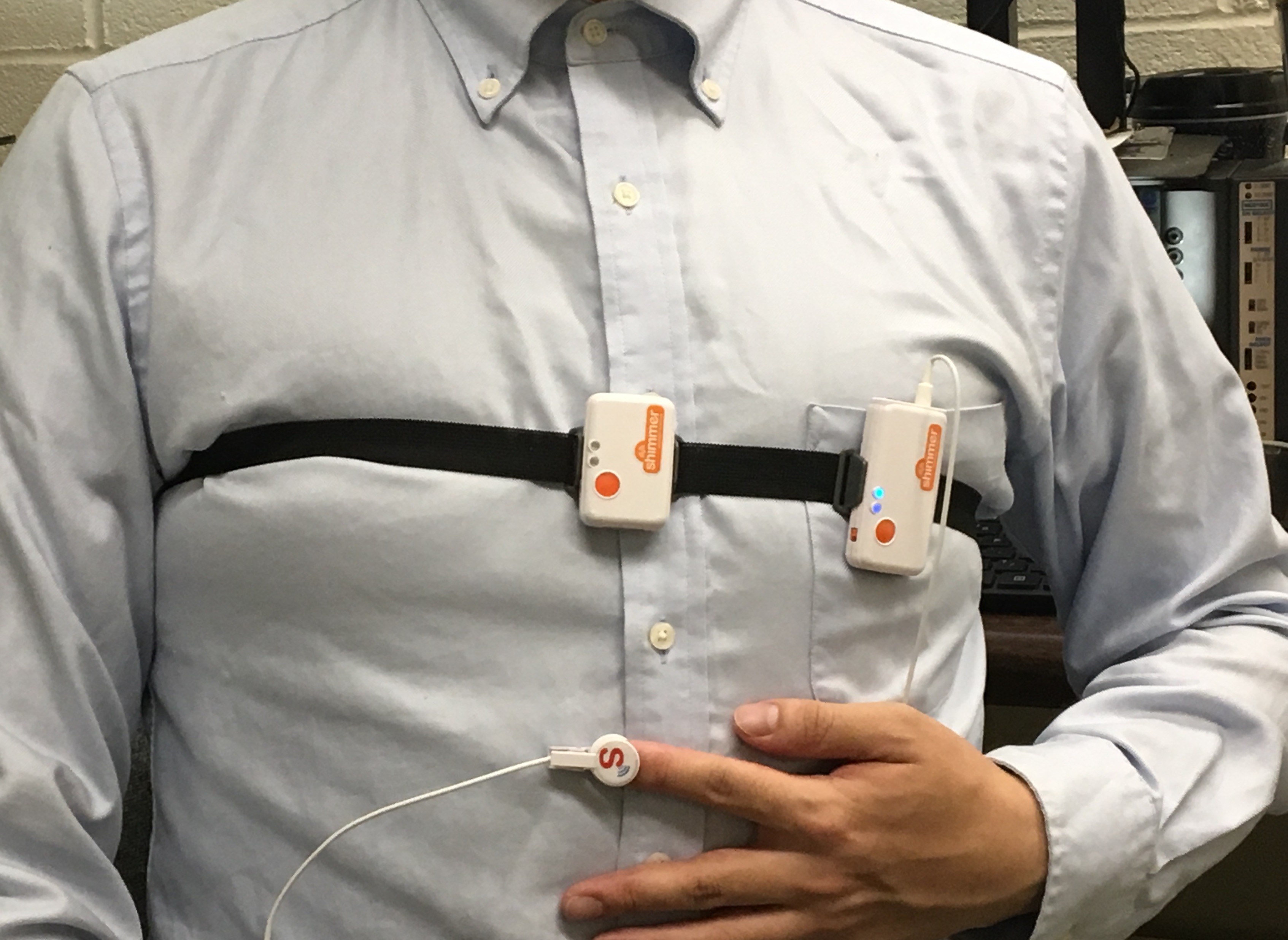 man with noninvasive chest sensors