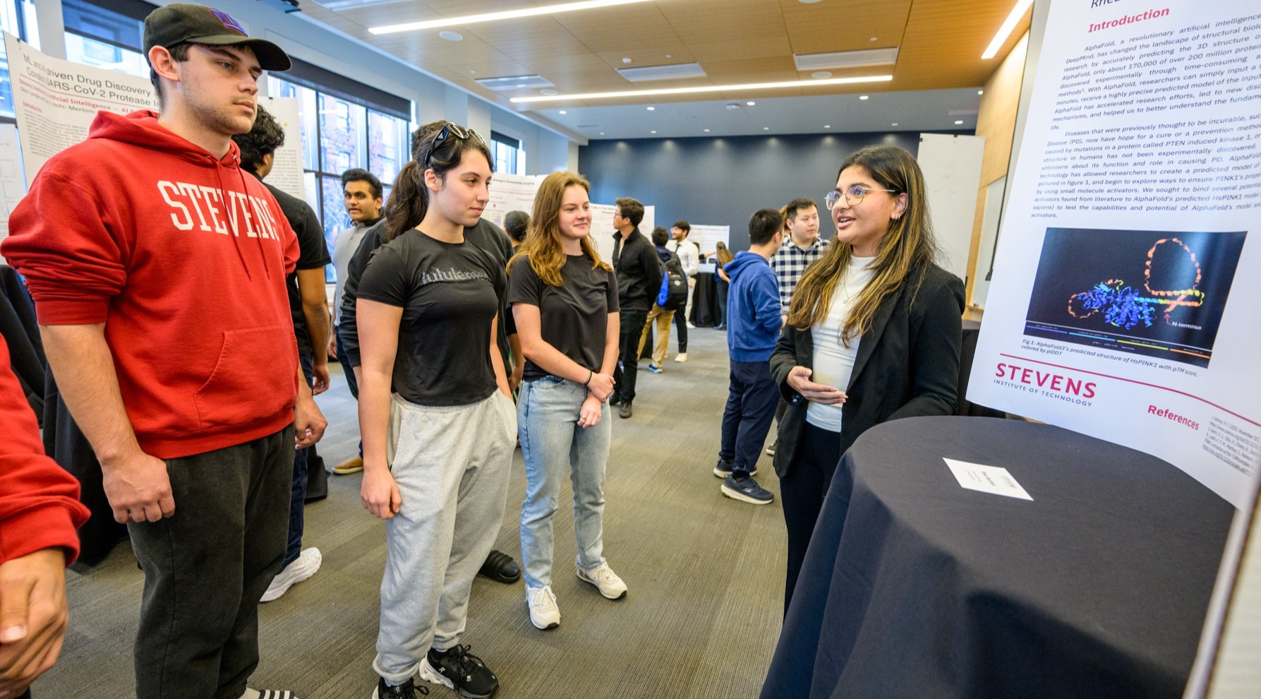 Stevens students viewing a student presentation.