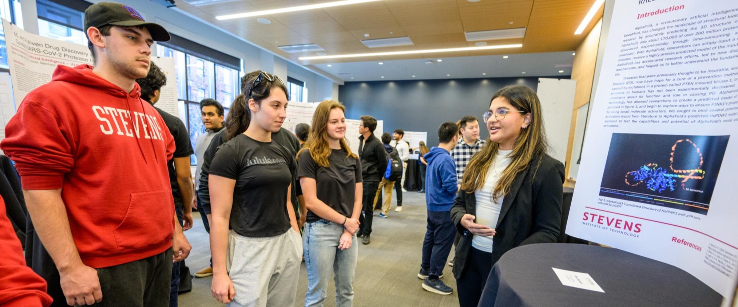 Stevens students viewing a student presentation.