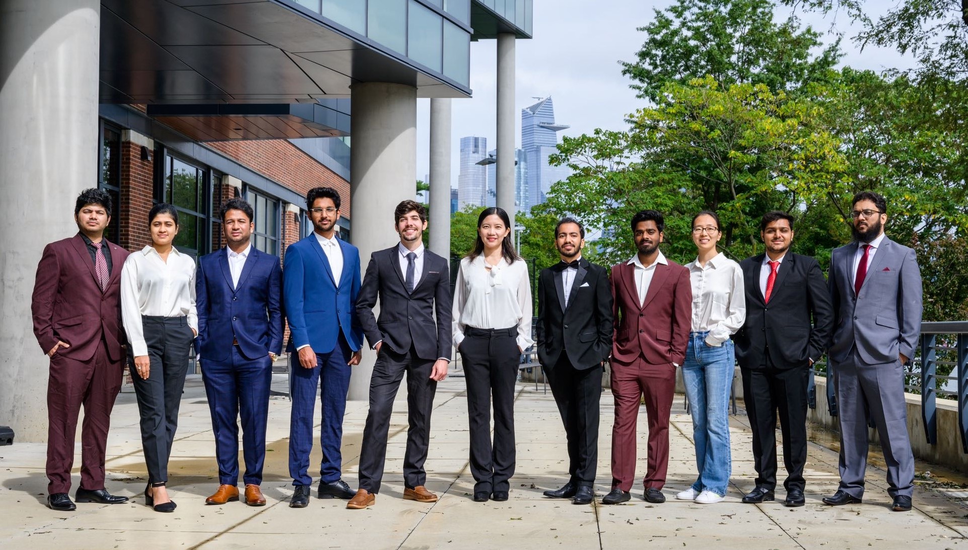 The members of Team NAM pose on campus. 