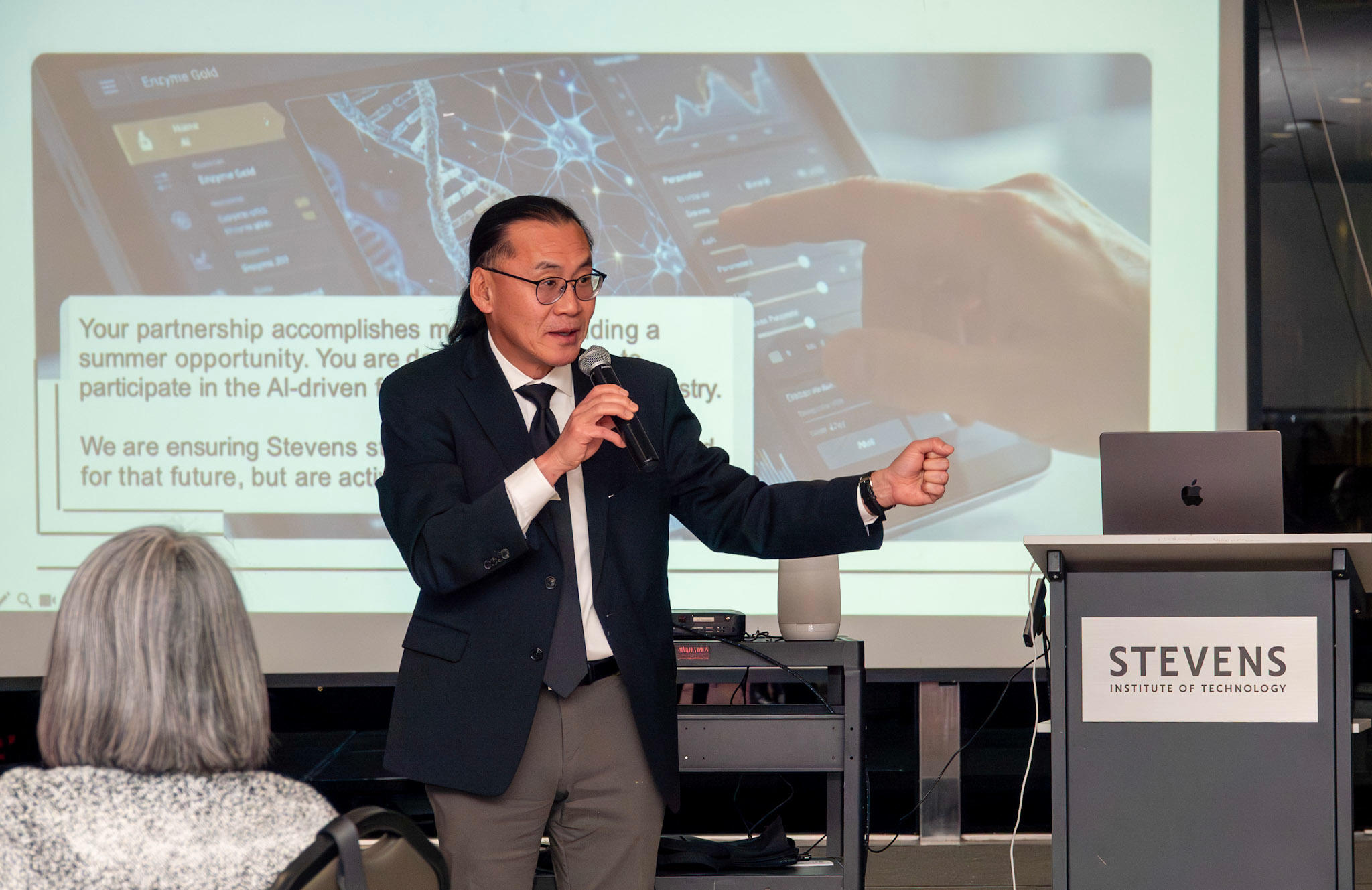 Woo Lee addresses a crowd.