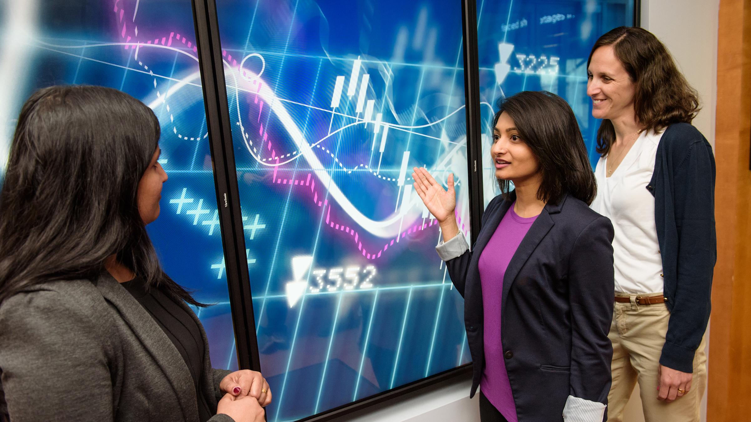 three female graduate students