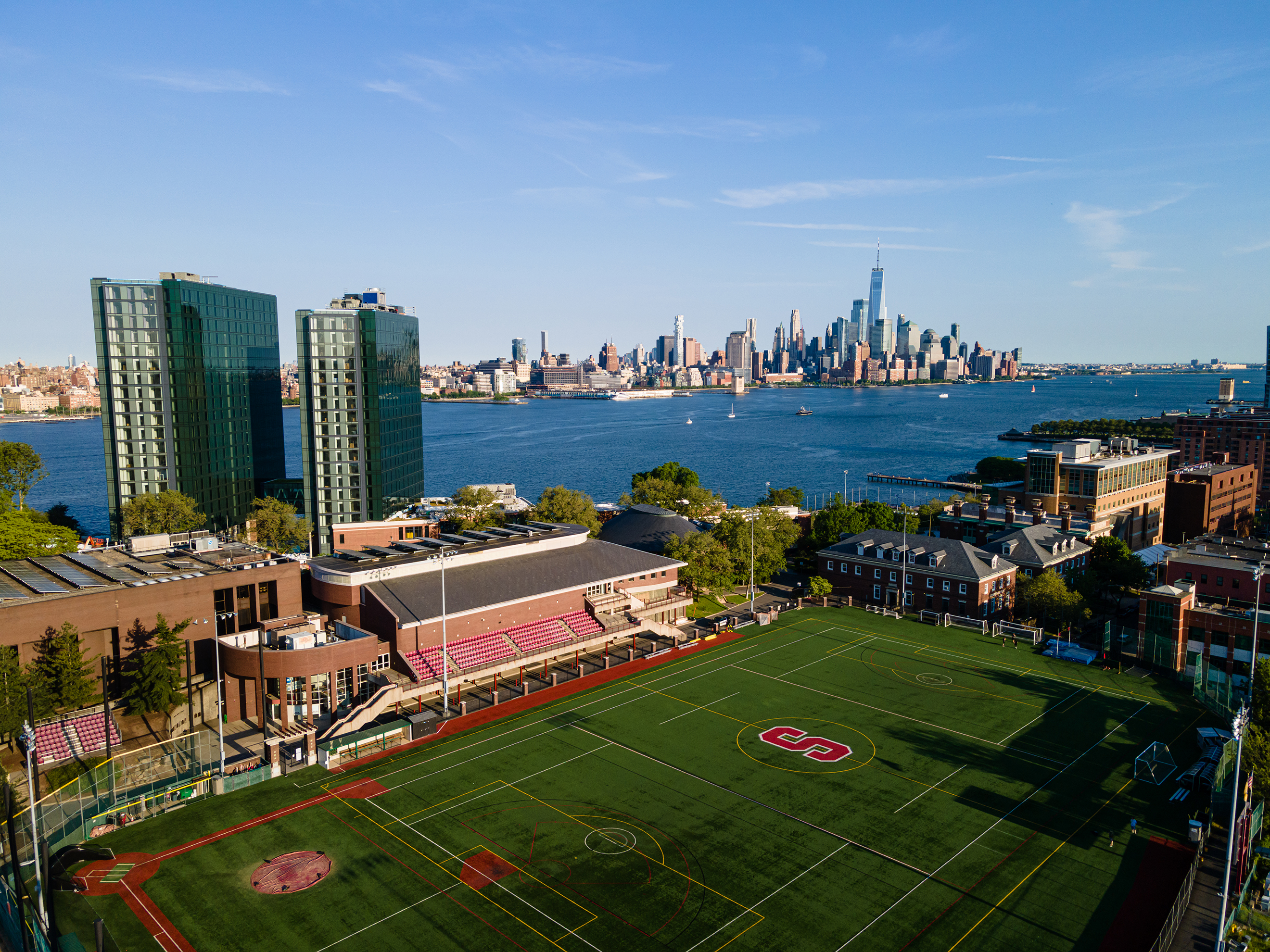 Aerial photo of Stevens campus with NYC in background