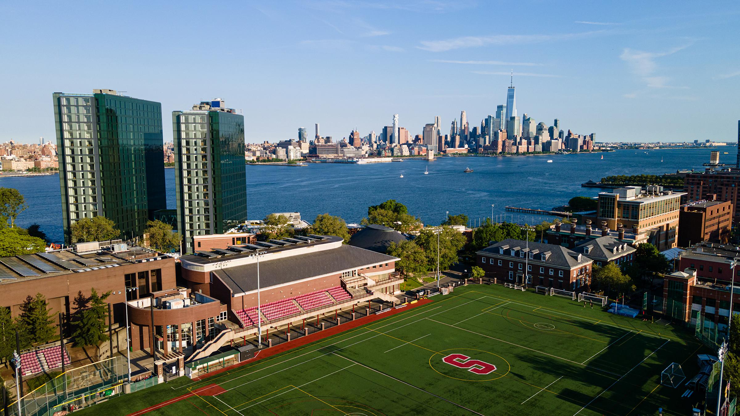 Aerial photo of Stevens campus with NYC in background