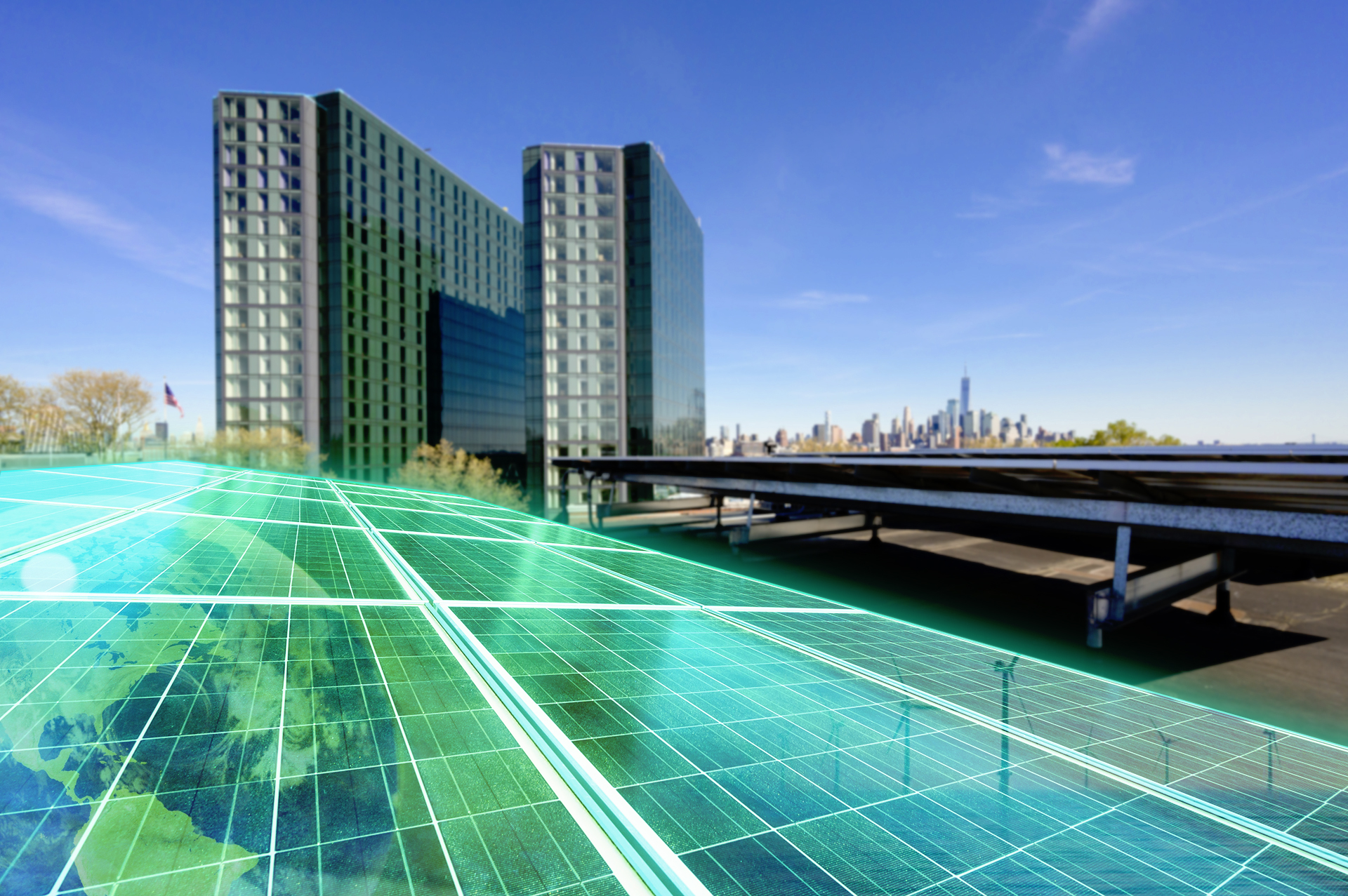 A solar panel highlighted in green sitting on a roof next to Stevens campus with a view of Manhattan.