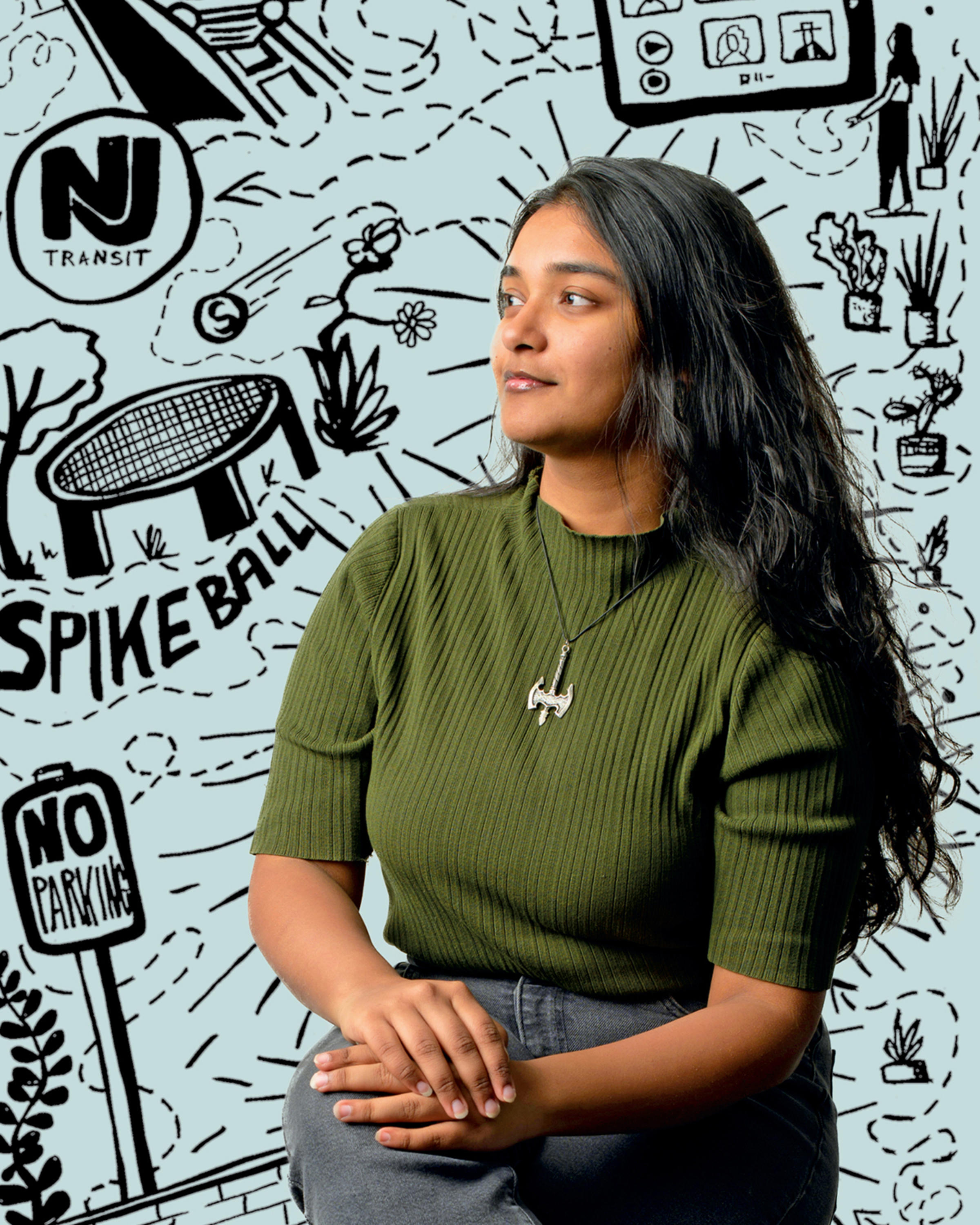 Portrait of Sharma in front of a dynamic illustration