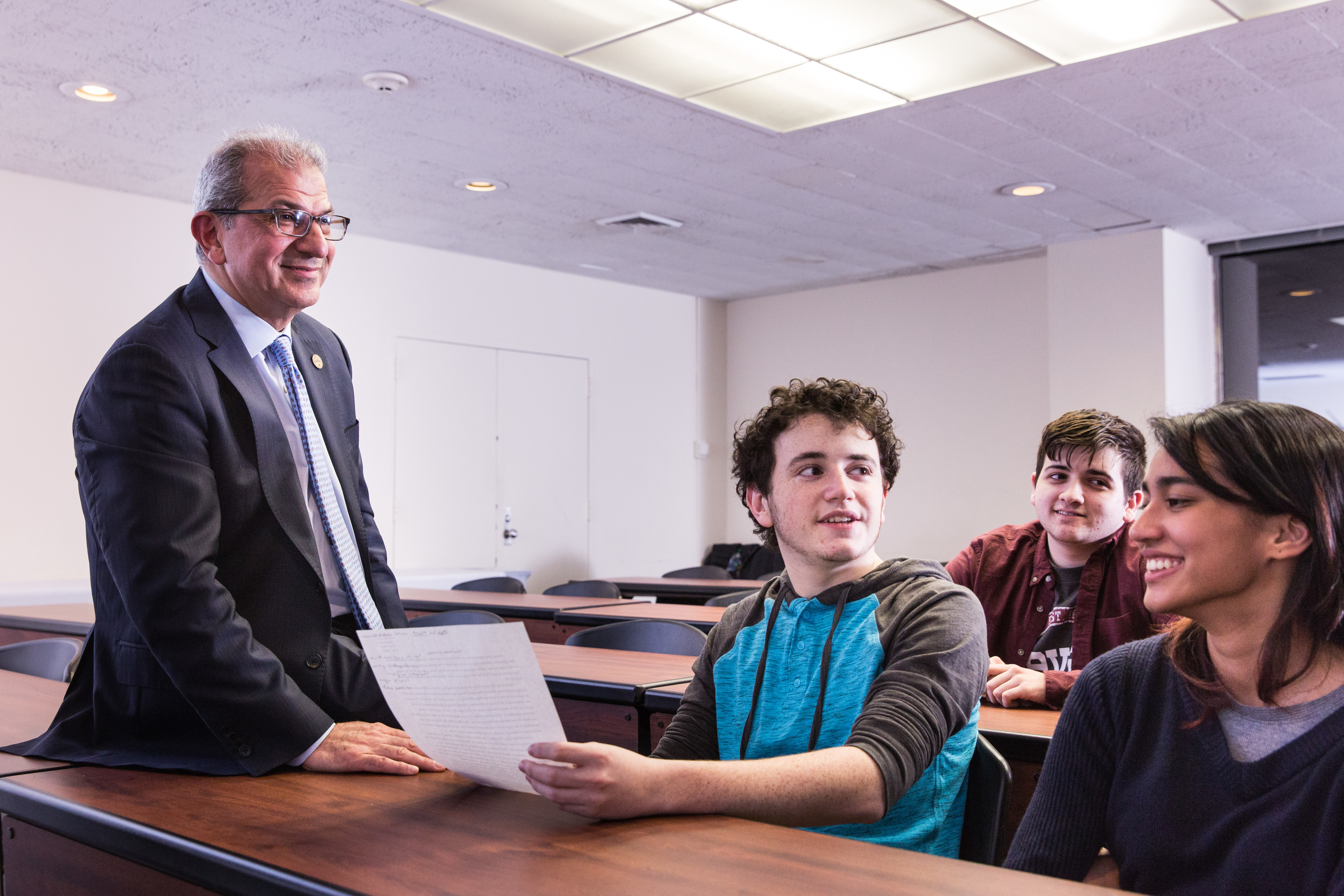 Students having a conversation with President Farvardin.