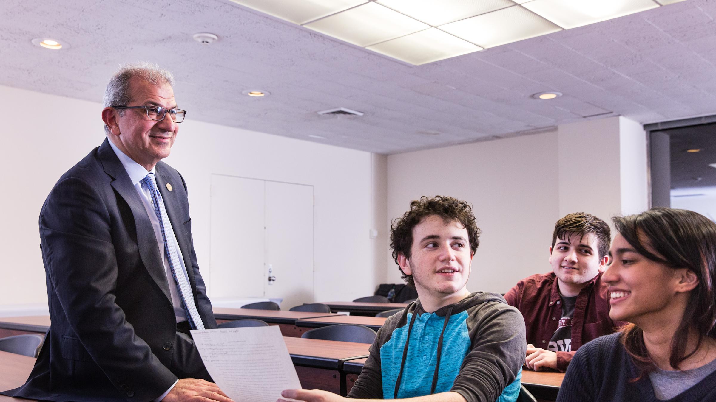 Students having a conversation with President Farvardin.