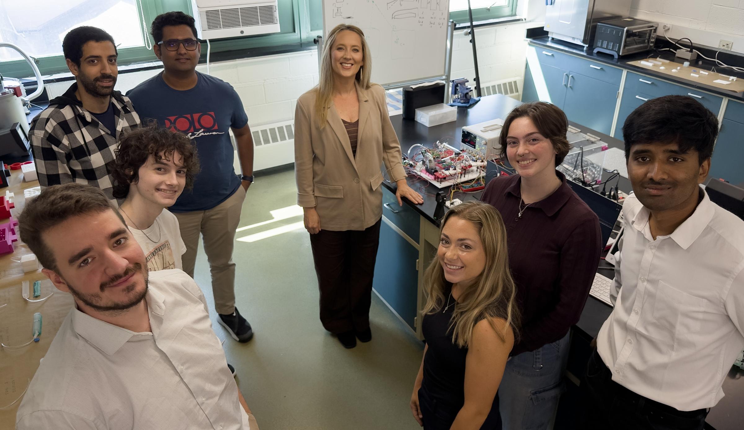 A photo of Jackie Libby with her lab group.