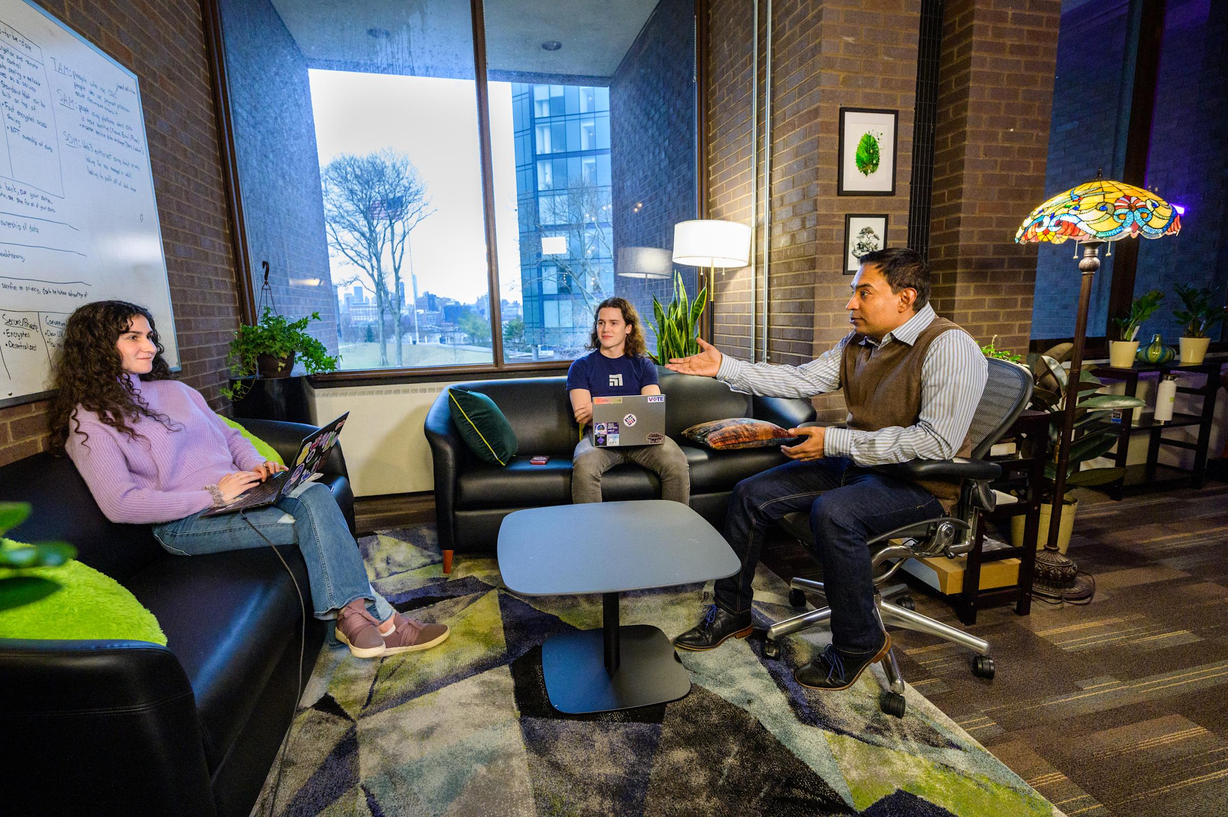 Students consult with Mukund as part of the Launchpad at Stevens program