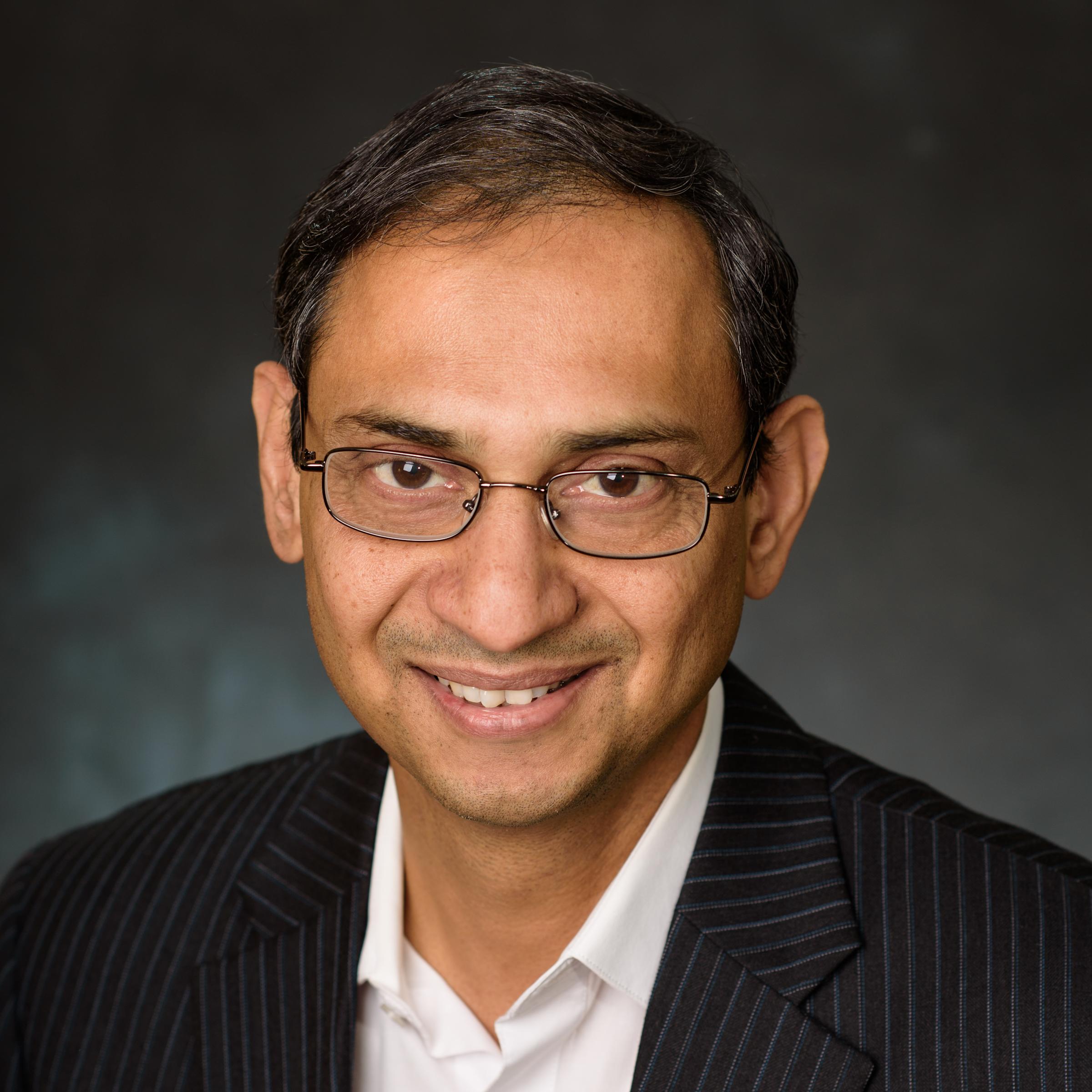 Official headshot of Kishore Pochiraju