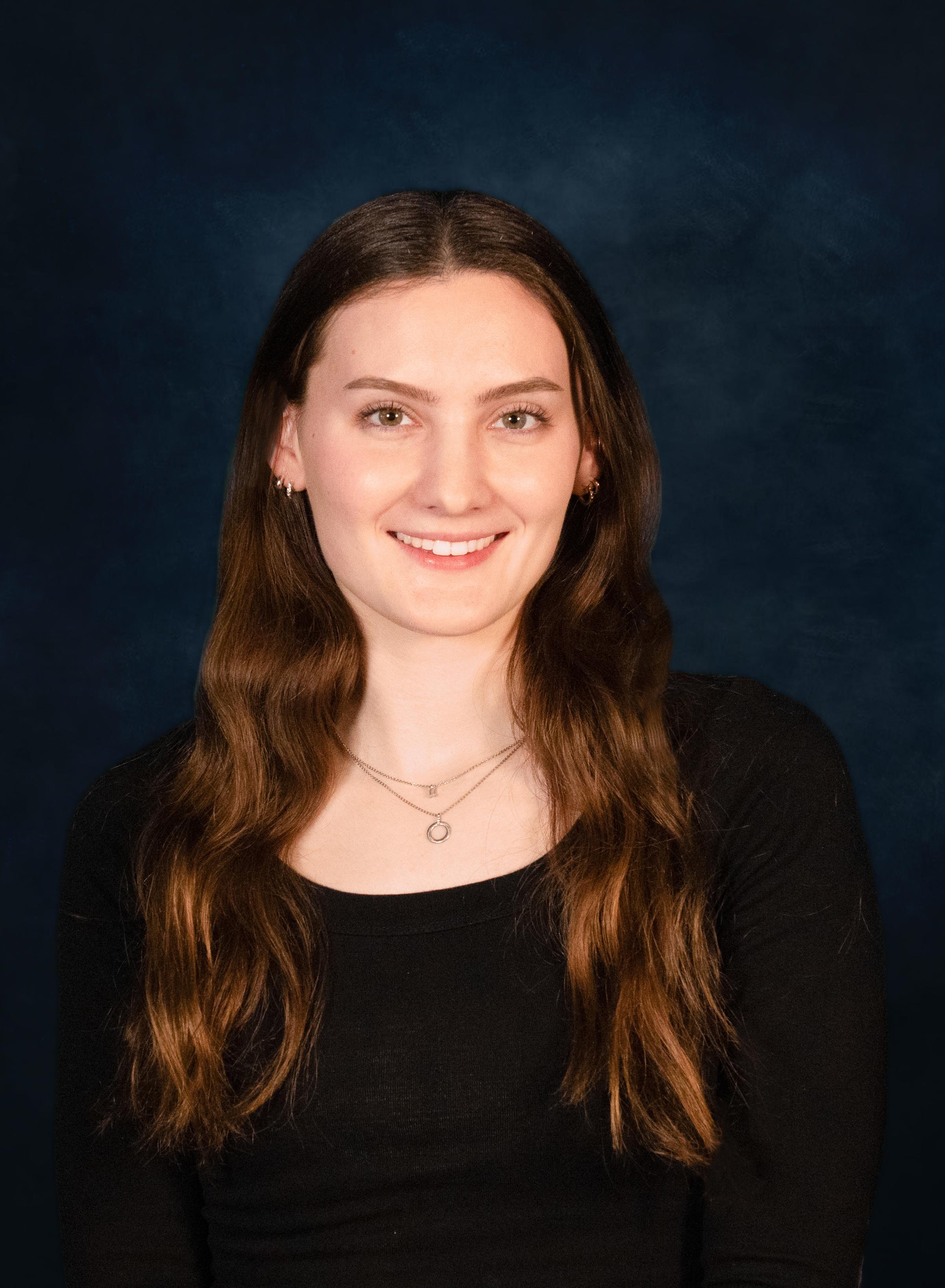 A headshot of a woman