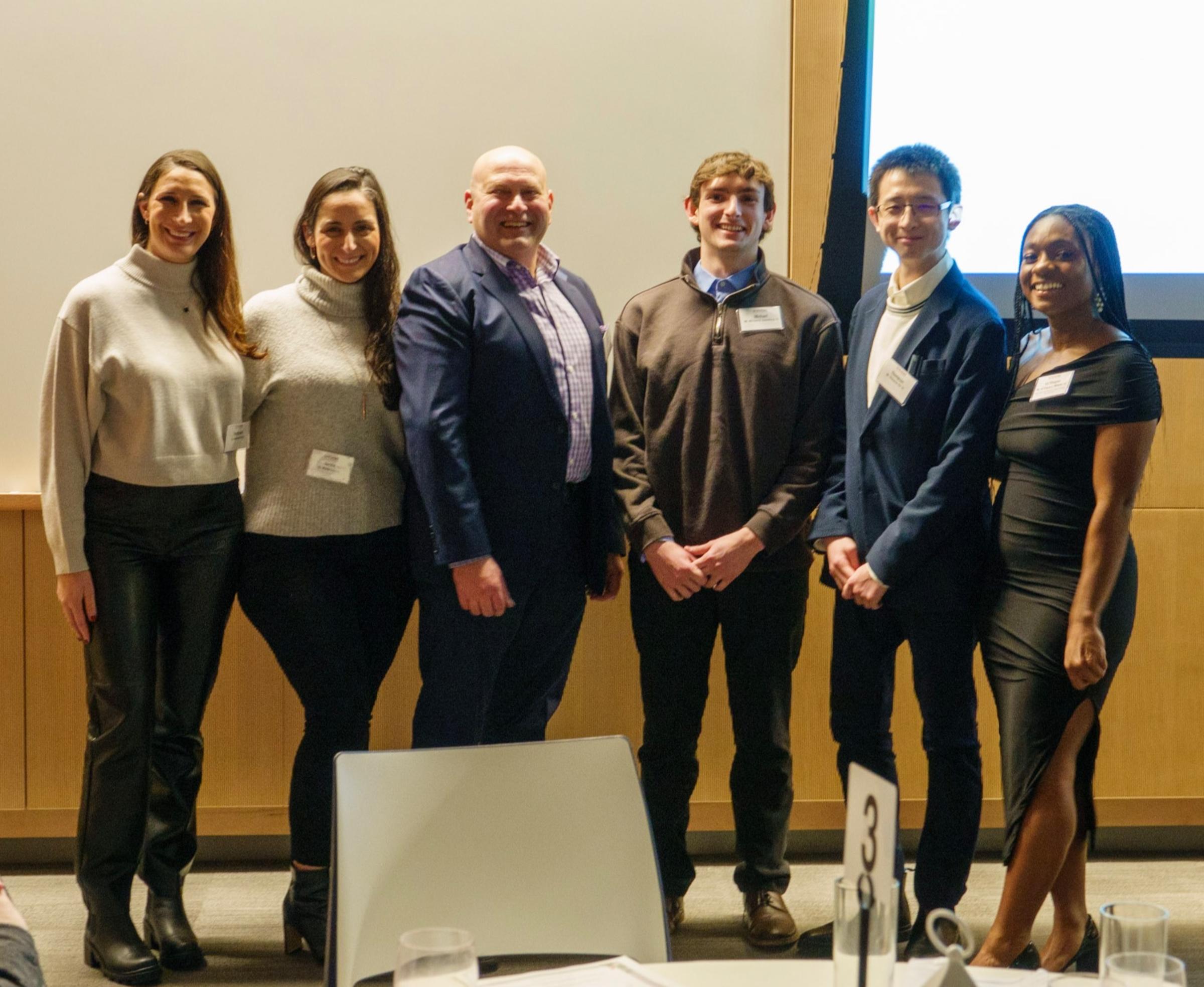 Lance Bruck with students at CCB awards 2022