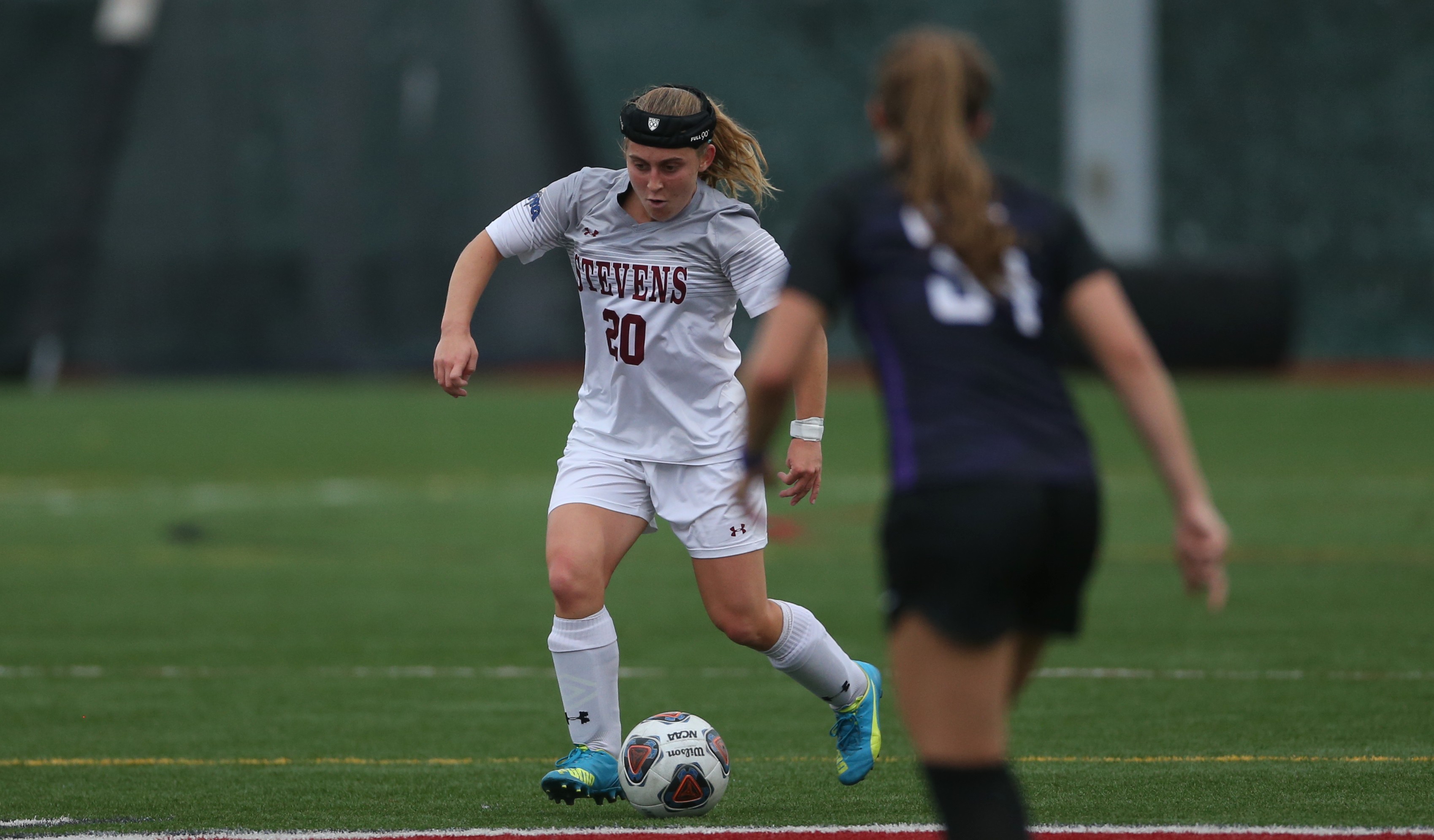 Julia Panko in competition on the soccer field 