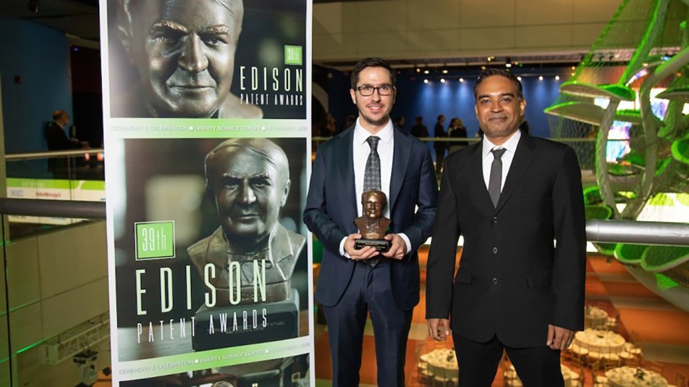 Mukund receiving an Edison award