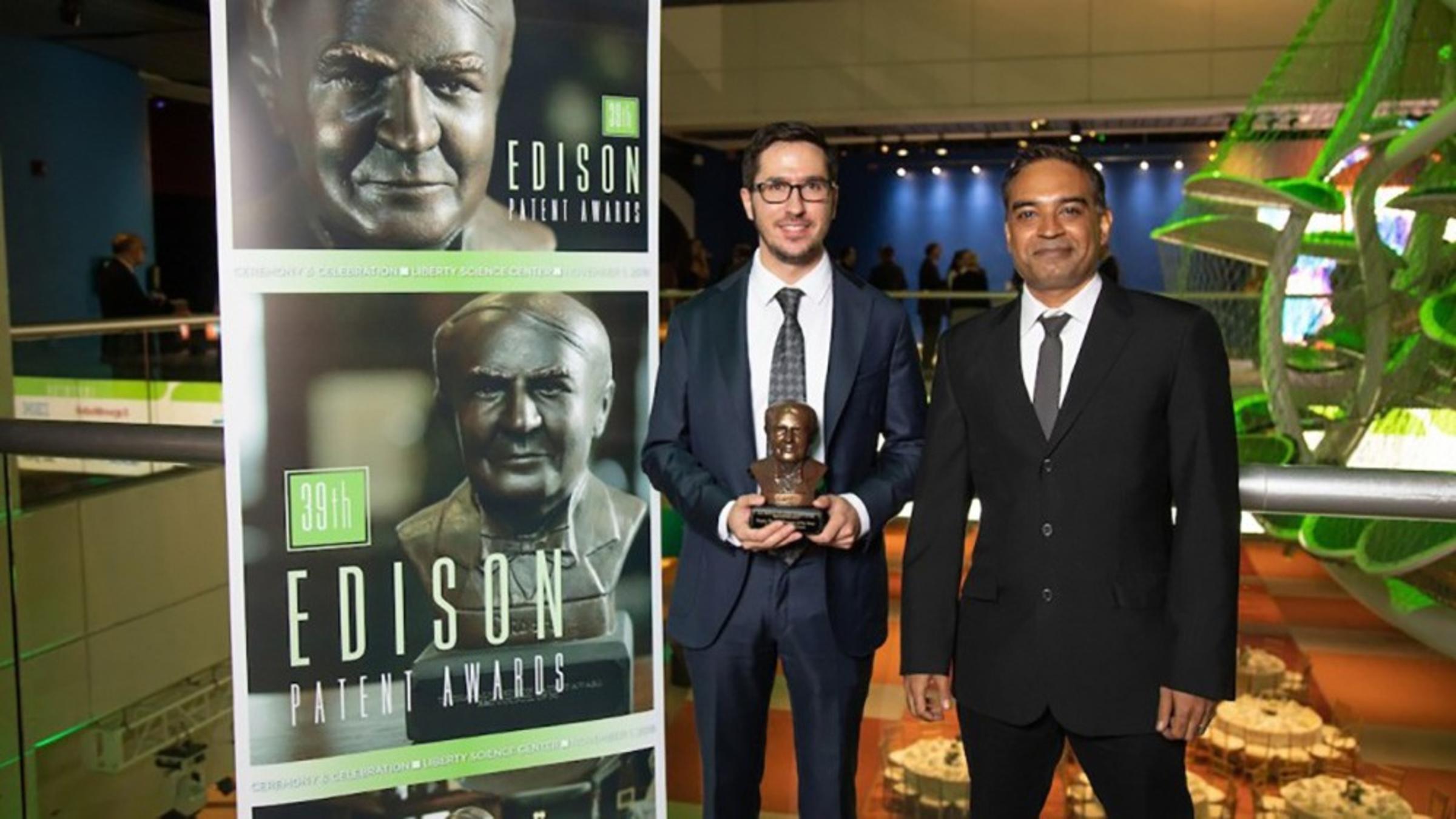Mukund receiving an Edison award
