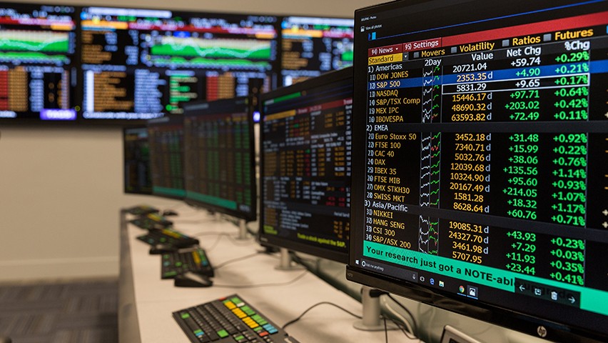 Screens showing financial data in the Hanlon Financial Systems Lab. 