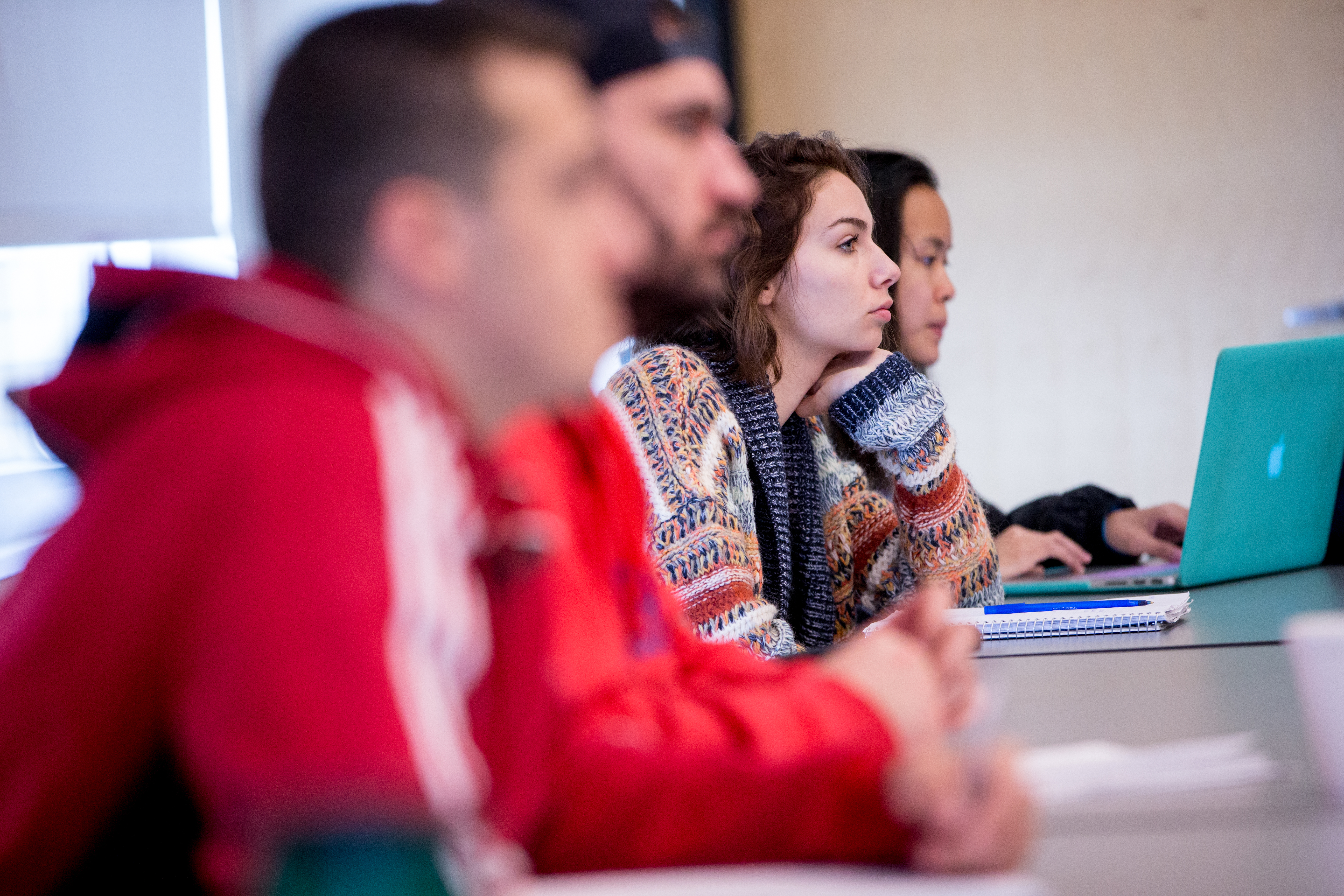 Students listen intently to lecture.