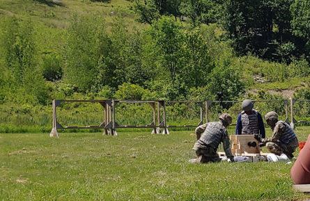 Three people firing a cannon