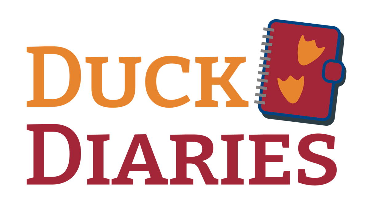 Duck Diaries stacked logo featuring notebook graphic with duck feet prints
