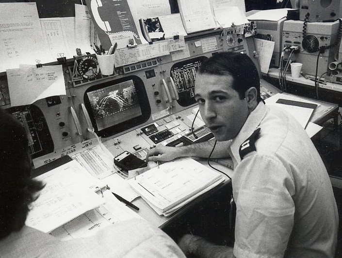 Black and white photo of Paul Porzio ’77 at Mission Control for NASA in 1982