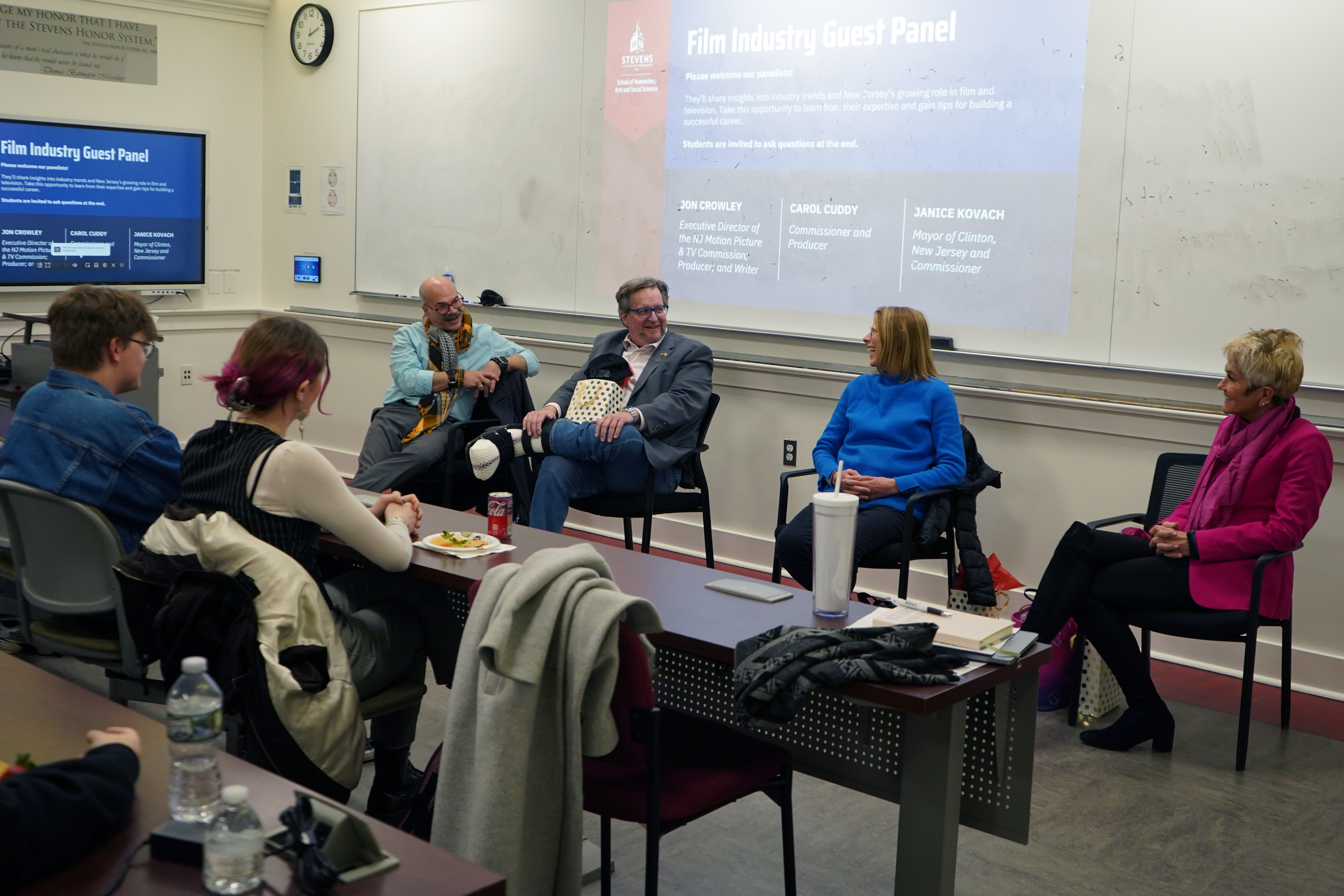 Jon Crowley, David W. Schoner, Jr., Carol Cuddy, Janice Kovach speaking at a student panel