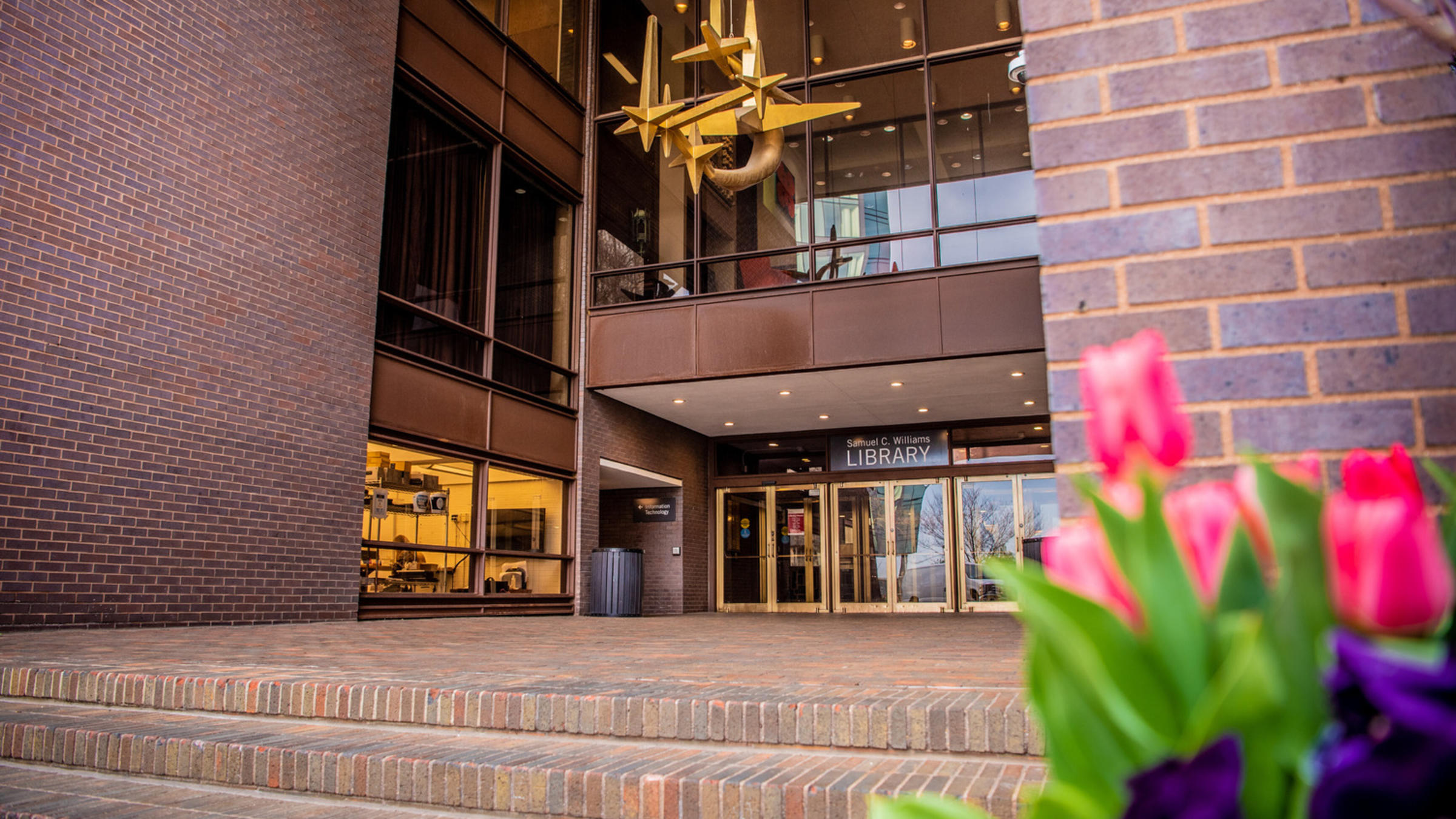 Exterior of the Samuel C. Williams Library photographed at night