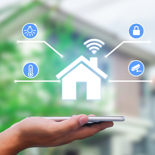 Pictograms representing smart lights, smart thermostats, smart locks and smart security cameras surround a symbol of a house with wifi, all hovering above hand holding cell phone