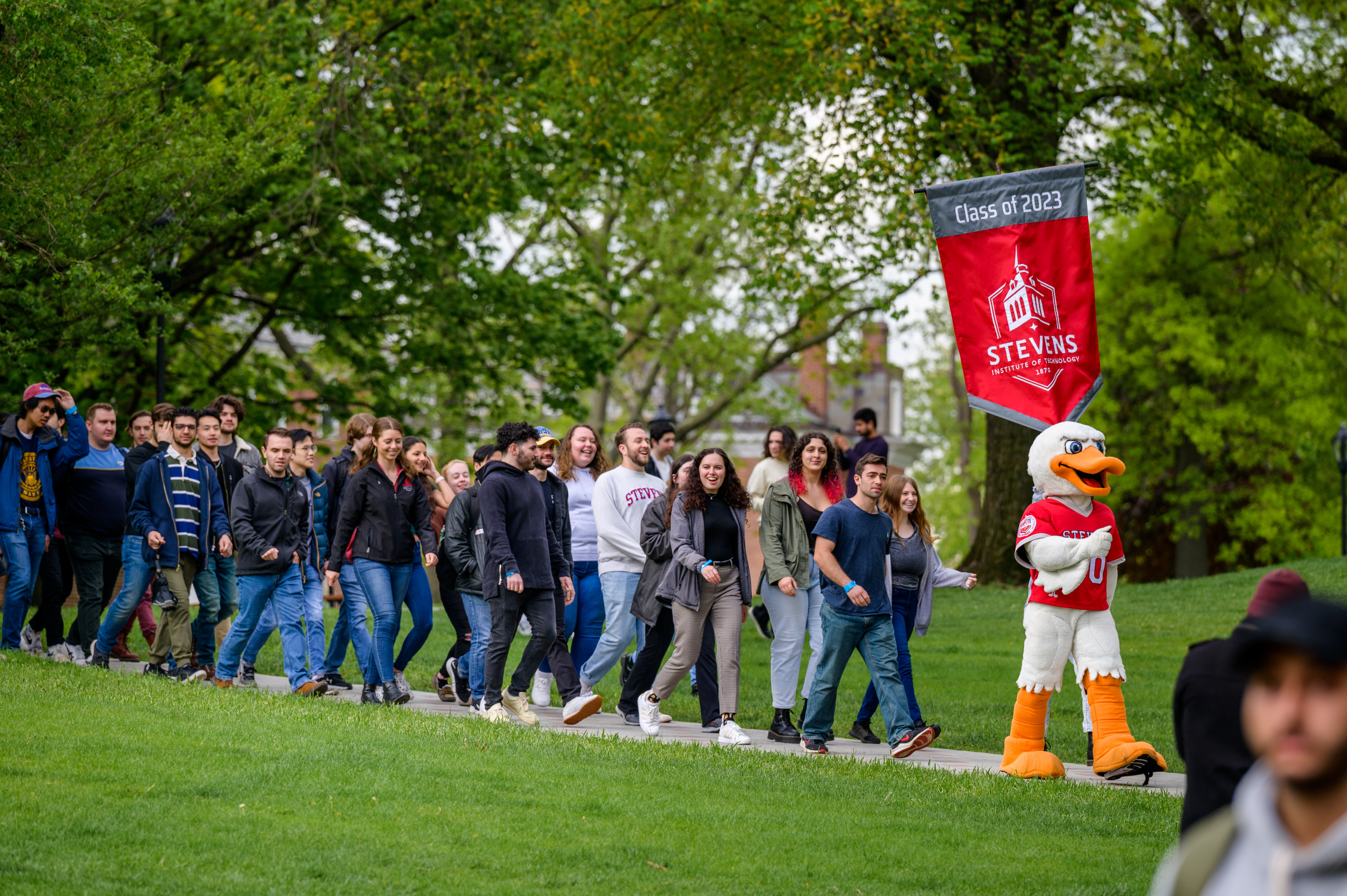 Seniors walking on Wittpenn Walk, led by Attila