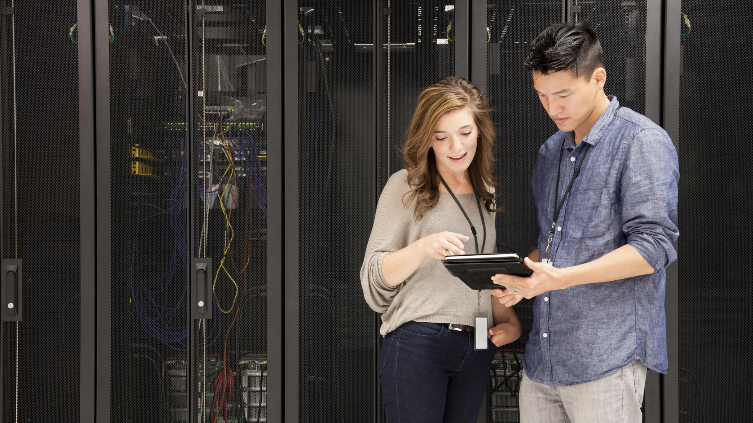 woman and man in a server room