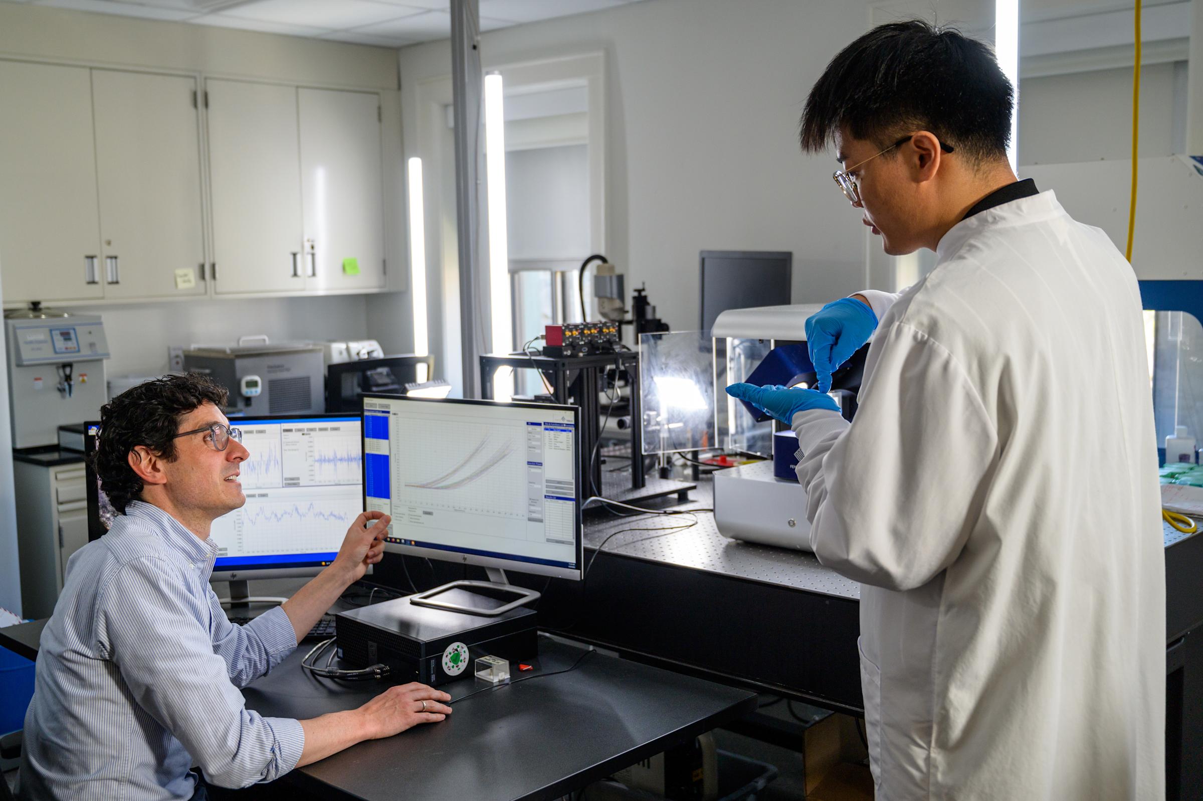 Johannes Weickenmeier and student in lab