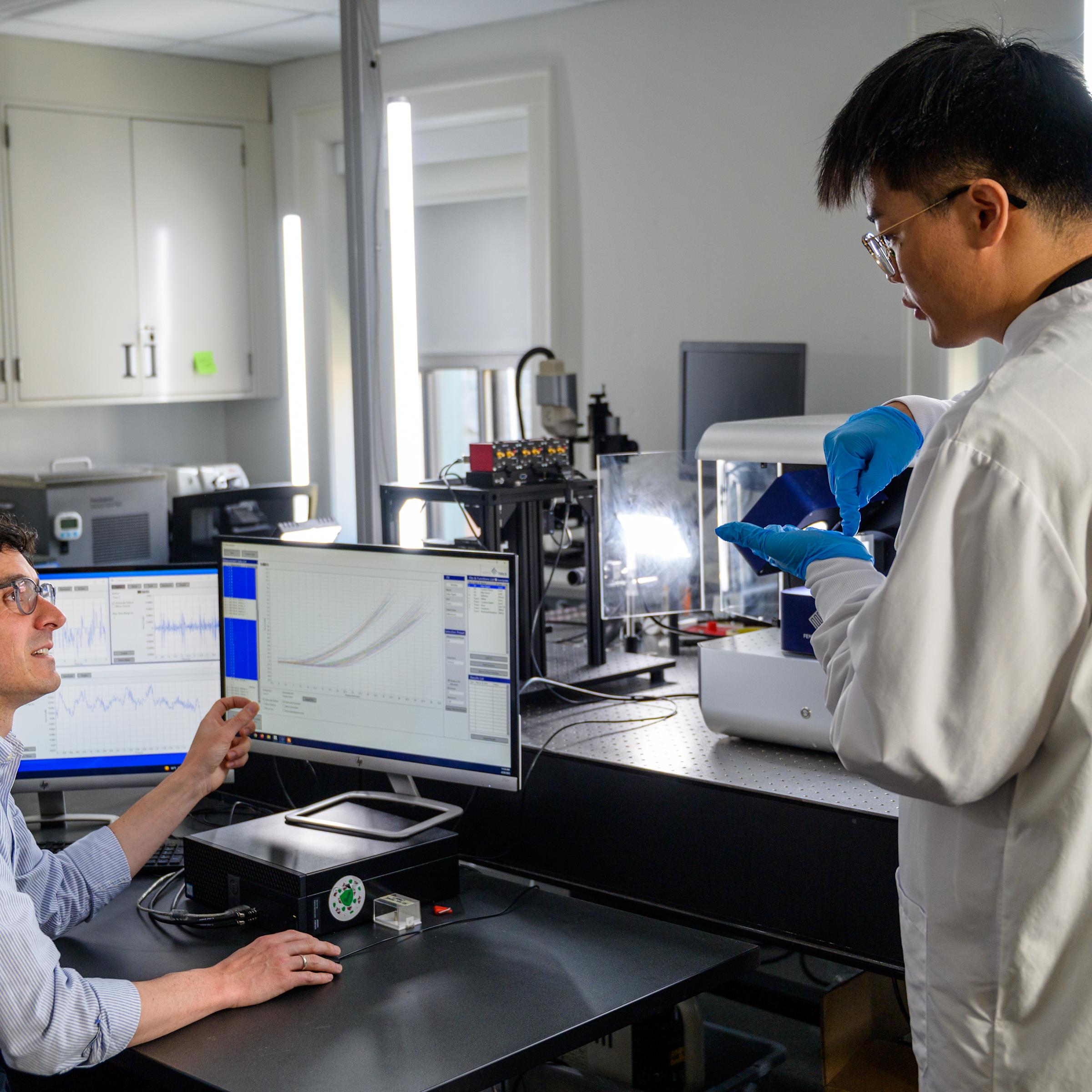 Johannes Weickenmeier and student in lab