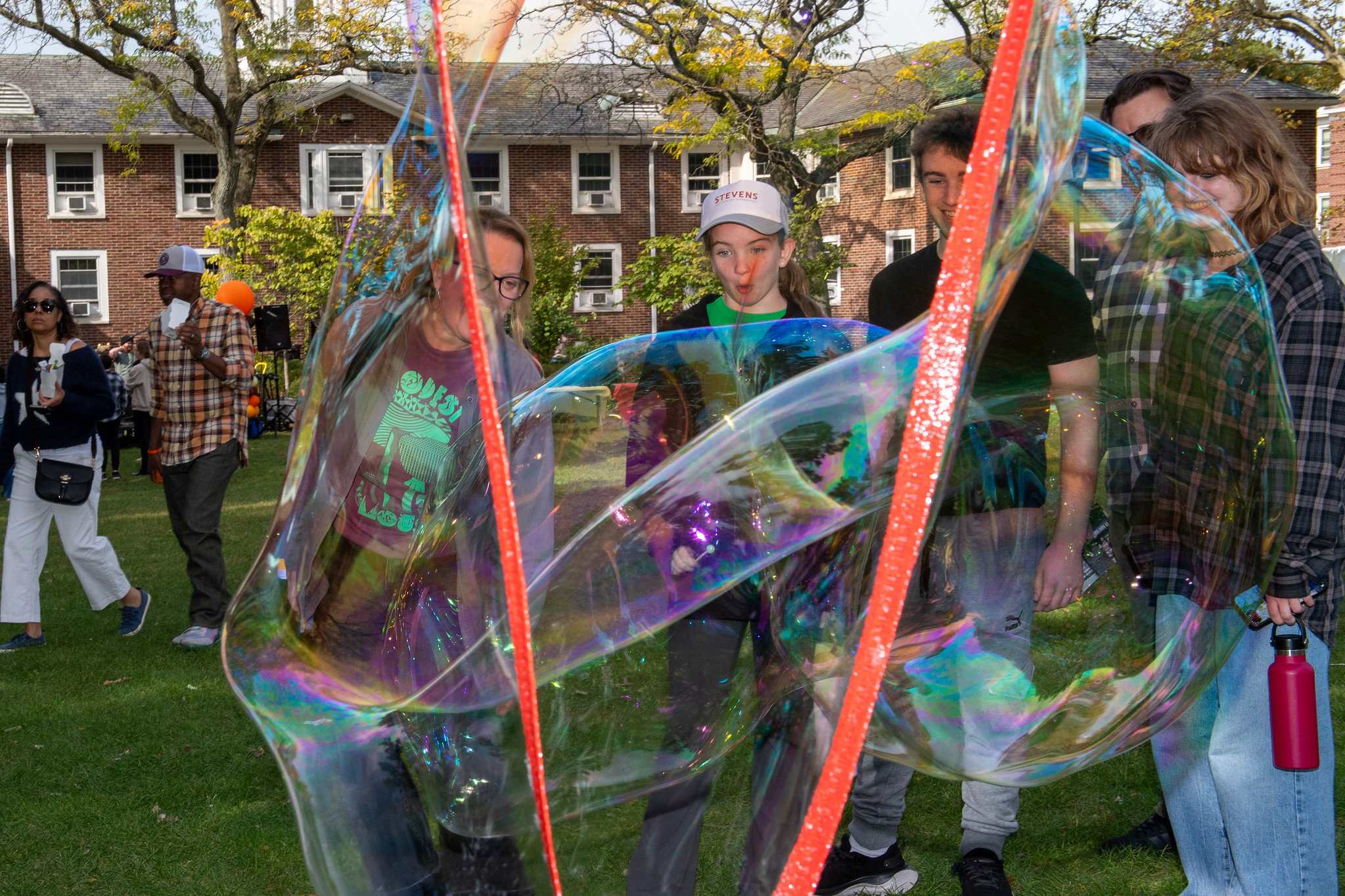 Family Day Header - Family under Balloon Arch