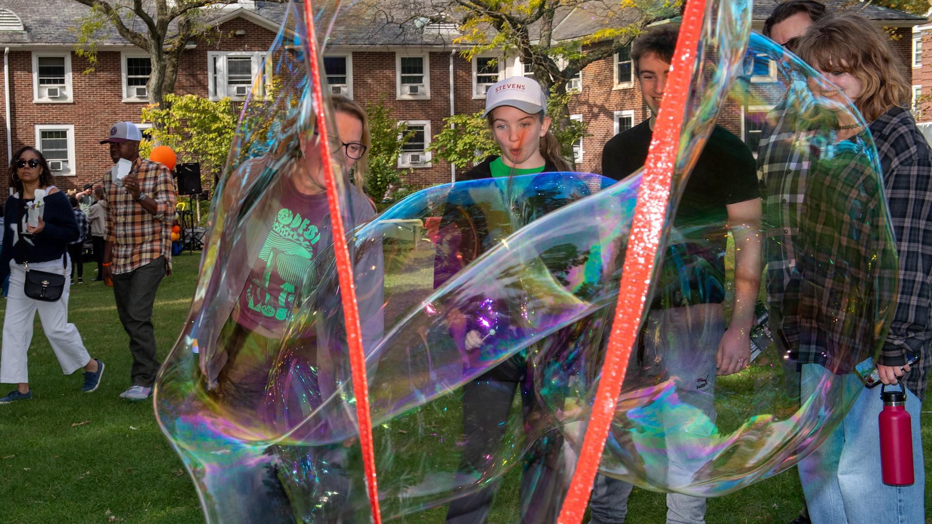 Family Day Header - Family under Balloon Arch