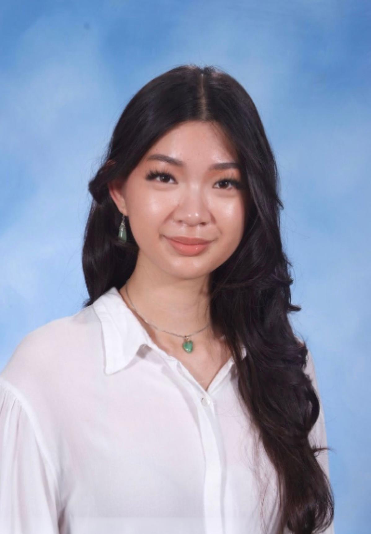 A headshot of a woman
