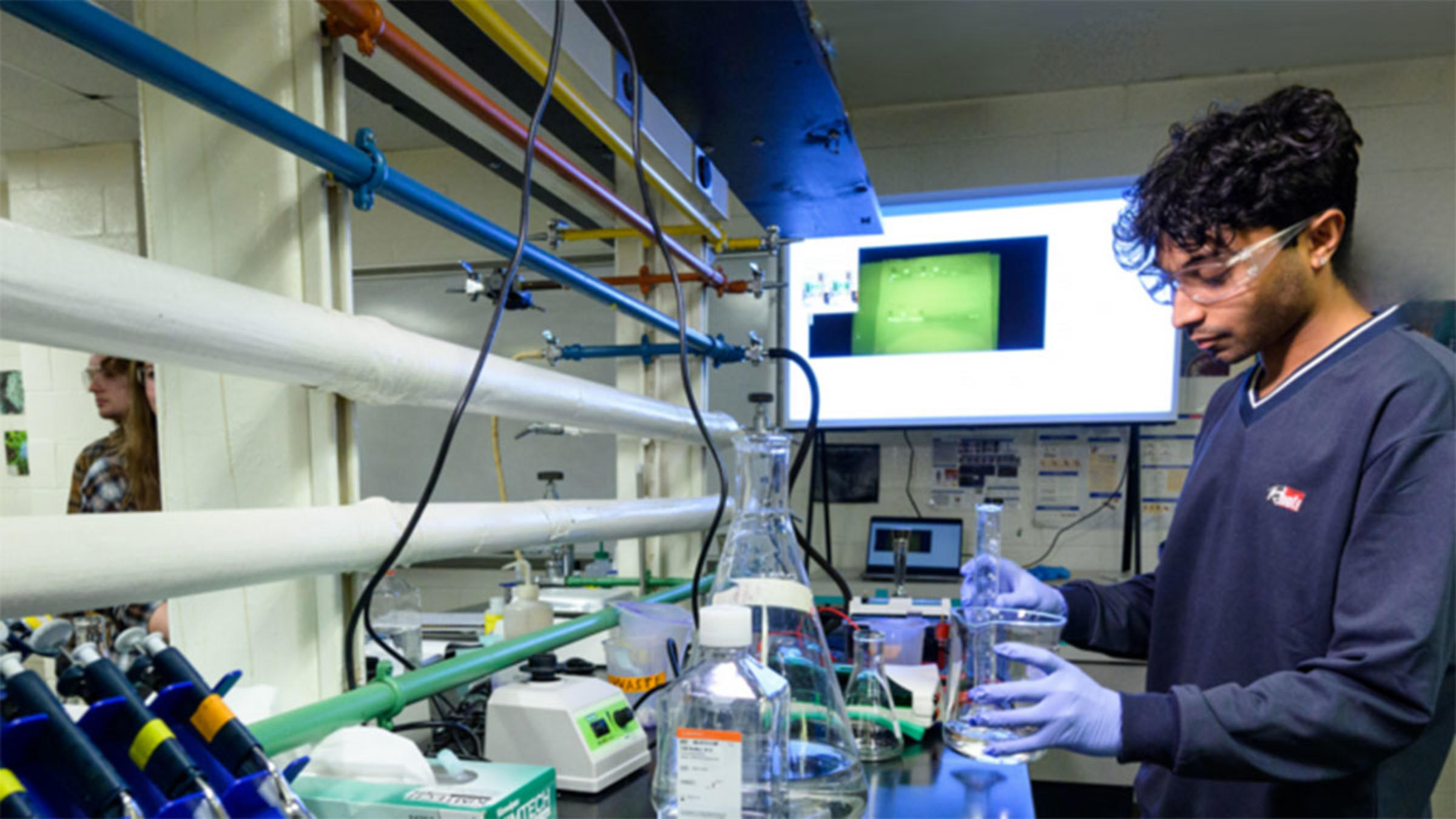 Student working in chemistry lab.