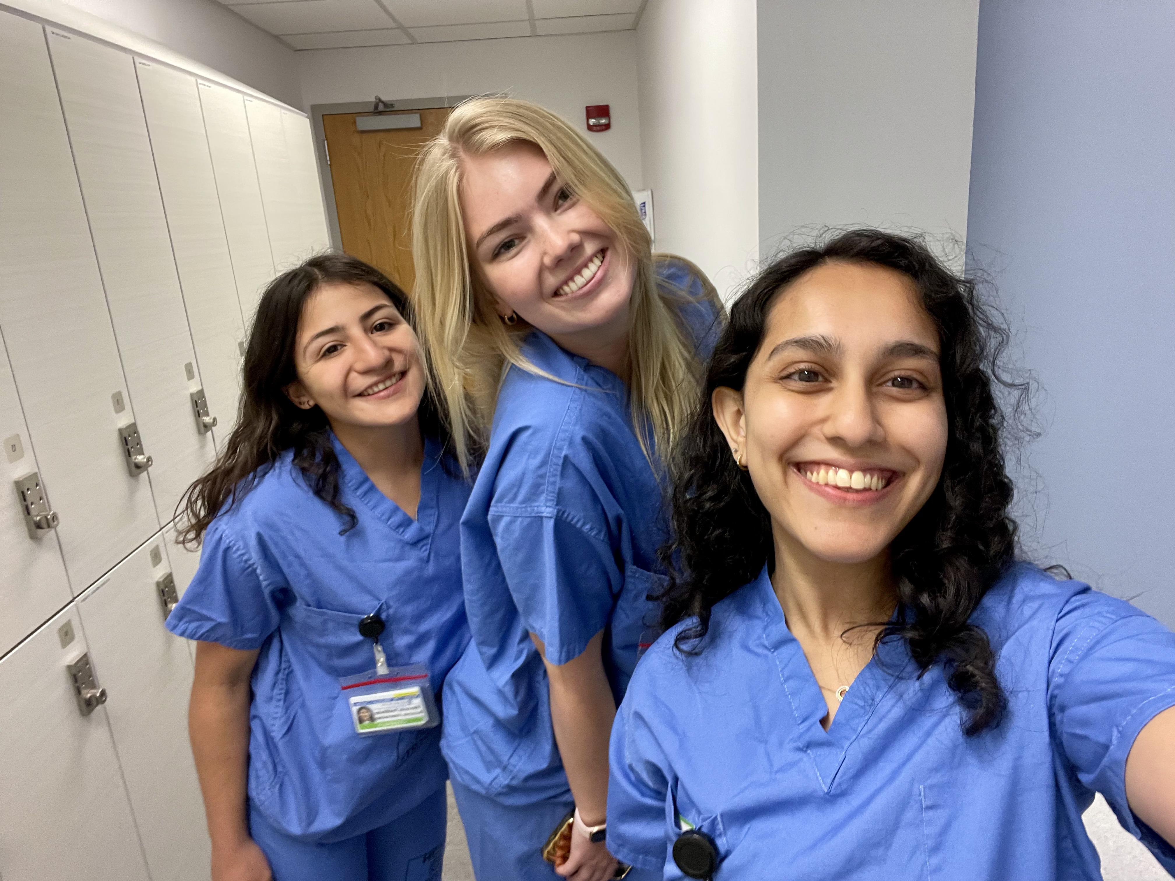 Photo of three JCMC students, left to right: Catalina Abusada ’24, Sophia Mains '23, and Vrinda Modi ’25