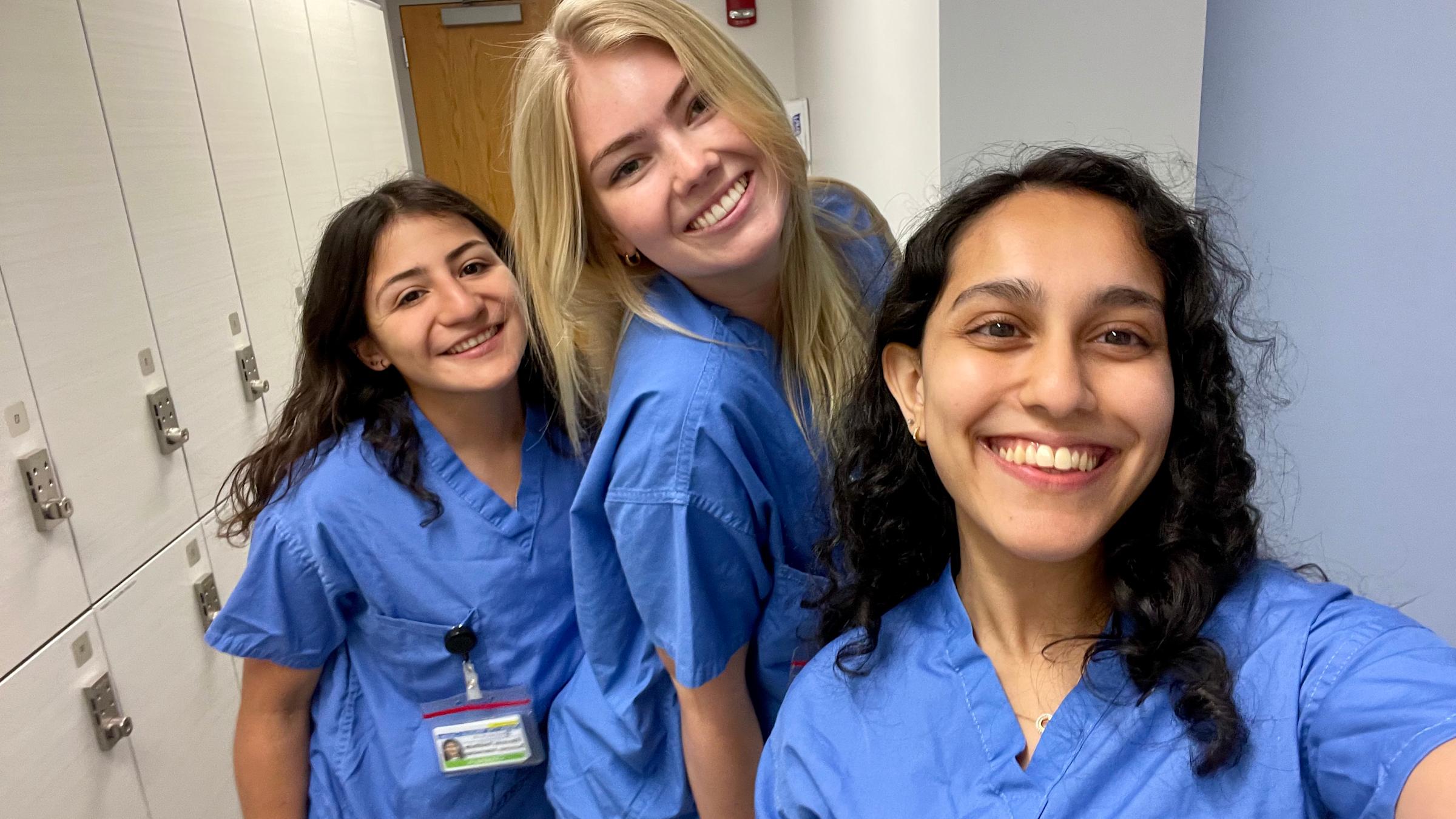 Photo of three JCMC students, left to right: Catalina Abusada ’24, Sophia Mains '23, and Vrinda Modi ’25