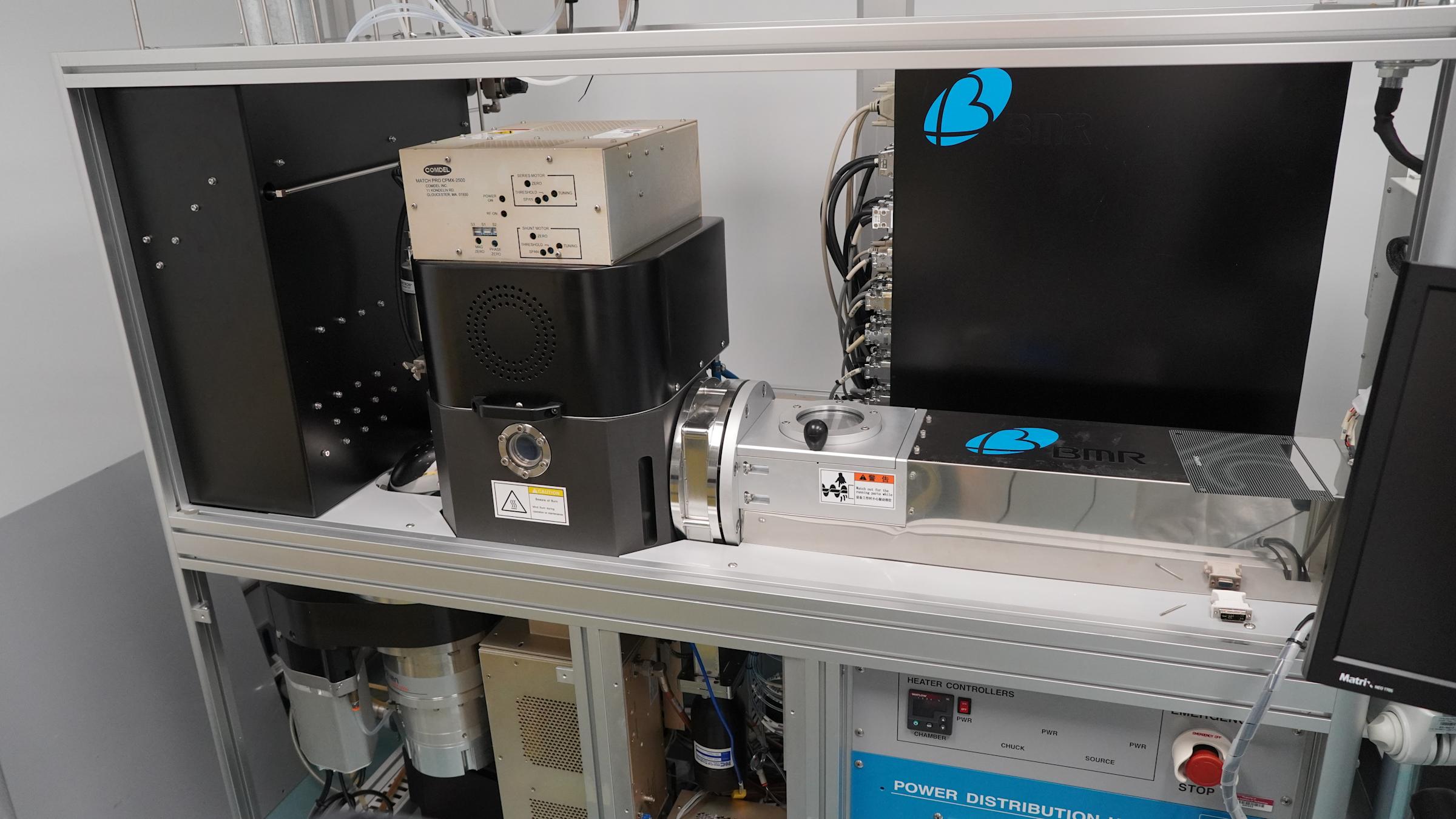 Inductively coupled plasma etcher (ICP) .