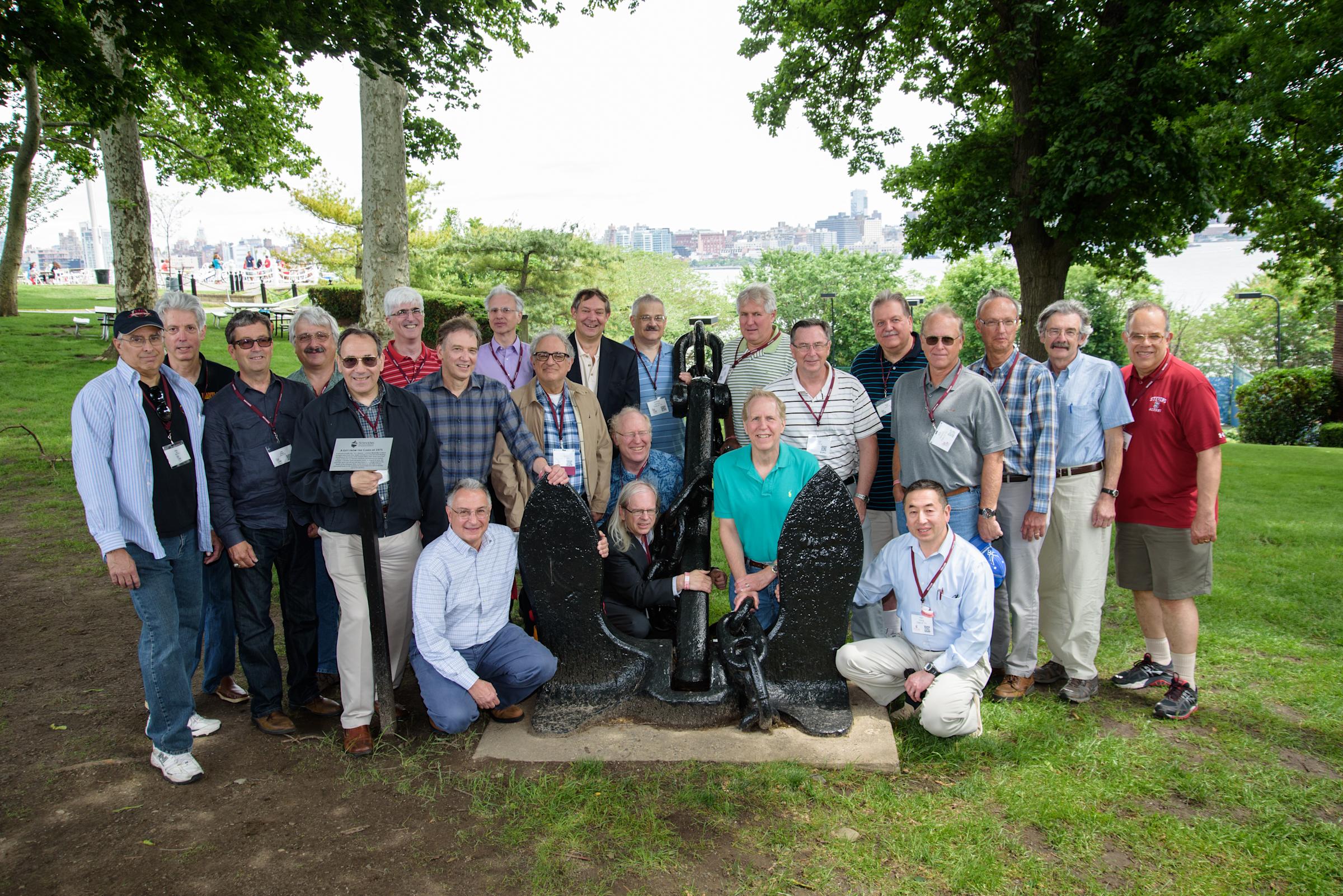 The Class of 1975 gather for their 40th reunion and pose for a group picture at the anchor of the SS Stevens in 2015.