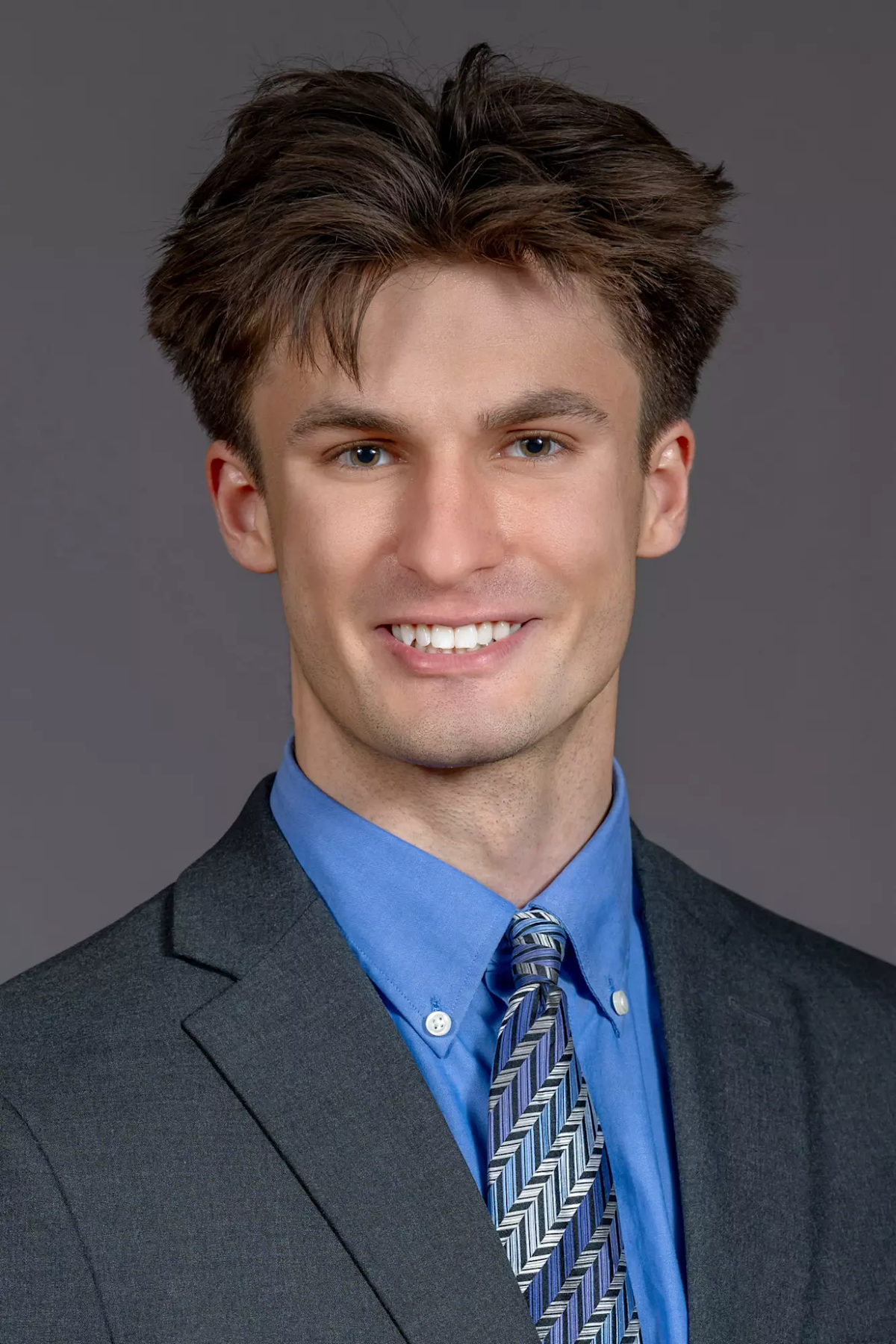 A headshot of a man