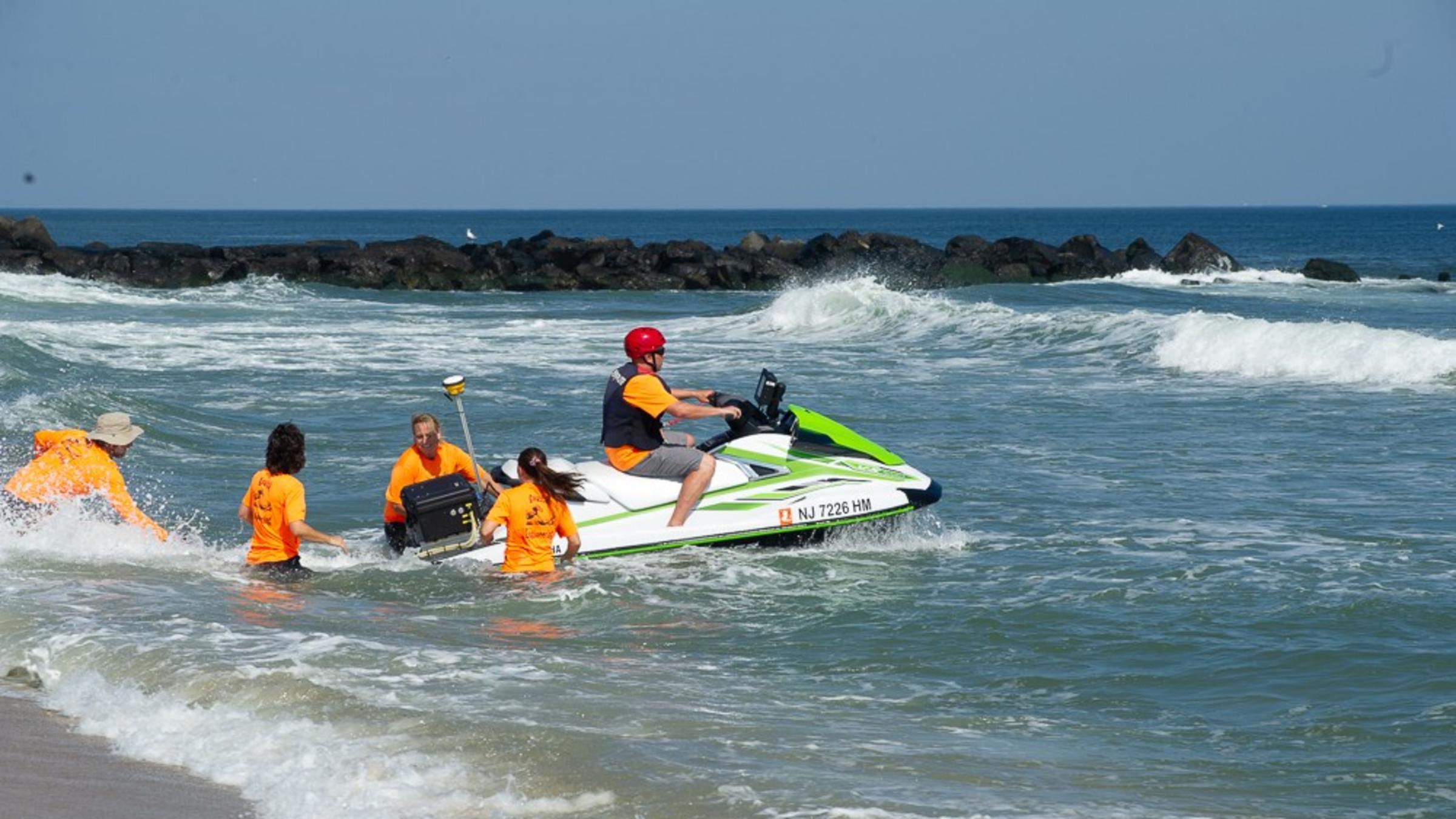 Small boat entering waater