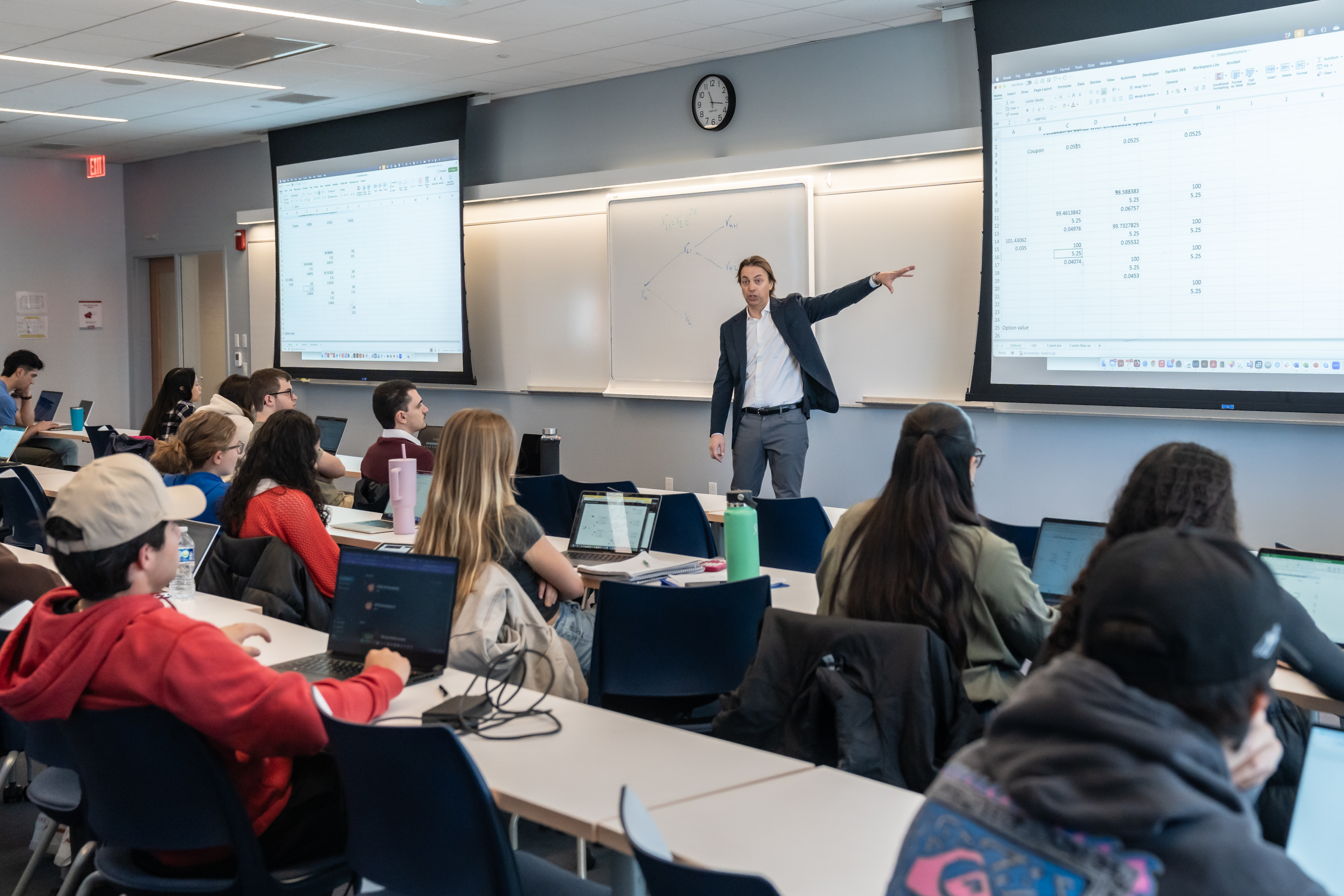 Professor Bonini teaching in a classroom