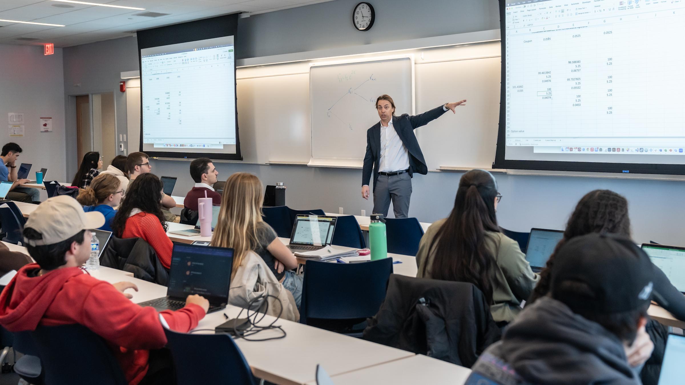 Professor Bonini teaching in a classroom